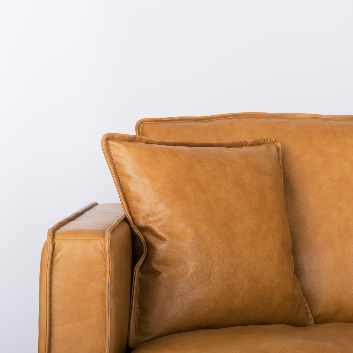 Mercana D'Arcy 111"L x 70"D x 33"H Tan Leather Right Chaise Sectional