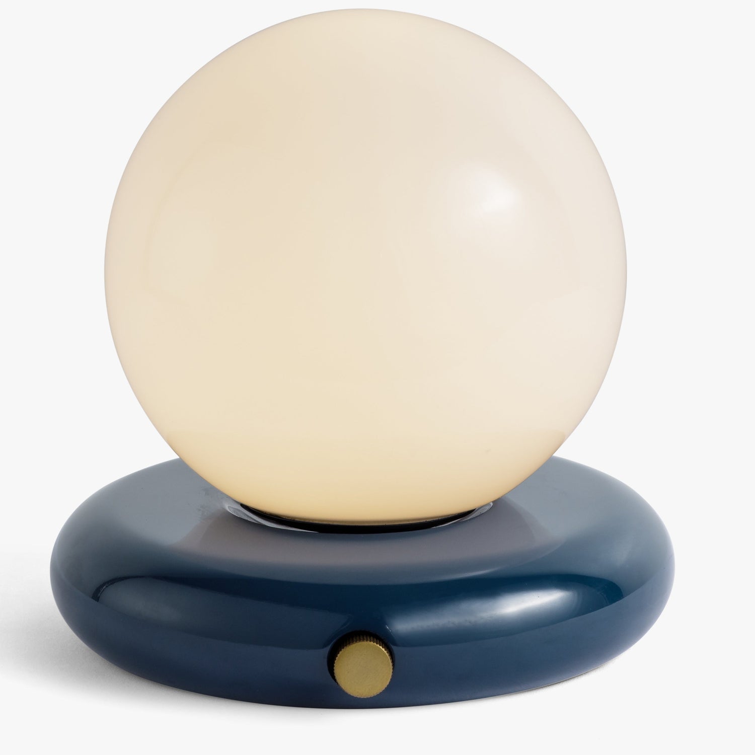 Co. House Designs Valencia Navy Portable Table Lamp illuminated and glowing