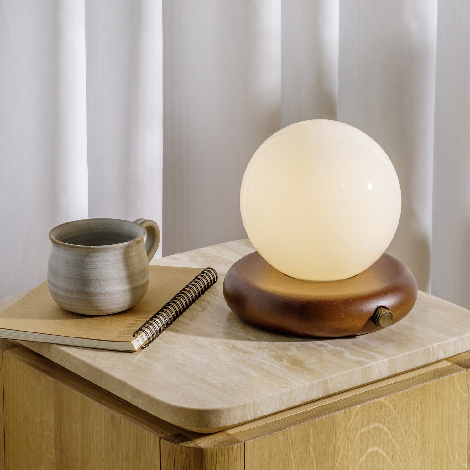Co. House Designs Valencia Walnut Portable Table Lamp styled in a room setting