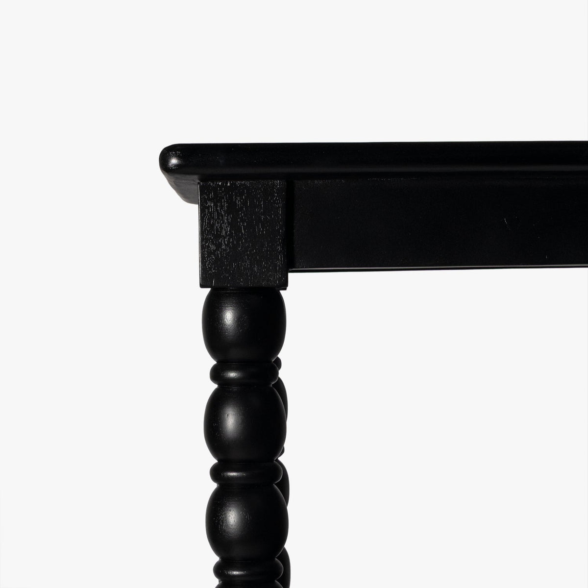 Close-up detail of the Co. House Designs Spindle Black Tall Bookcase