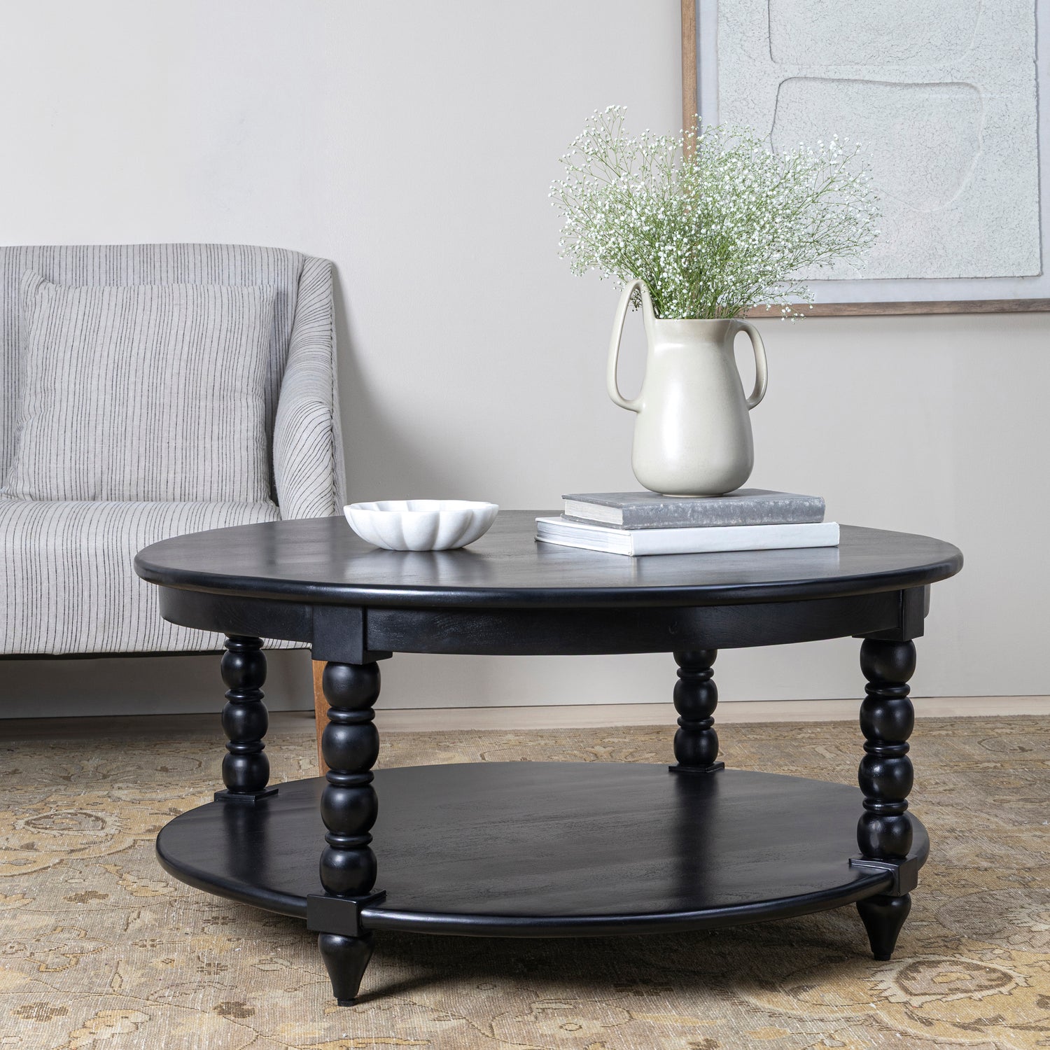 Co. House Designs Spindle Black Coffee Table styled in a room setting