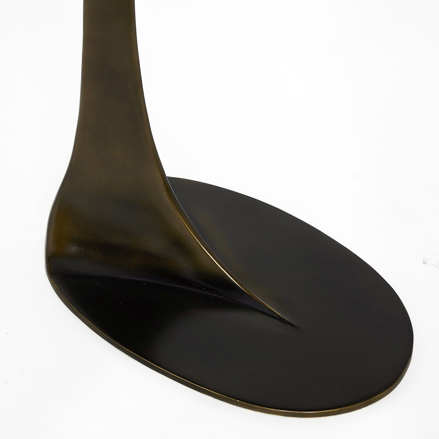 Interlude Home Duval Deep Bronze Grand Hugging Table styled in a room