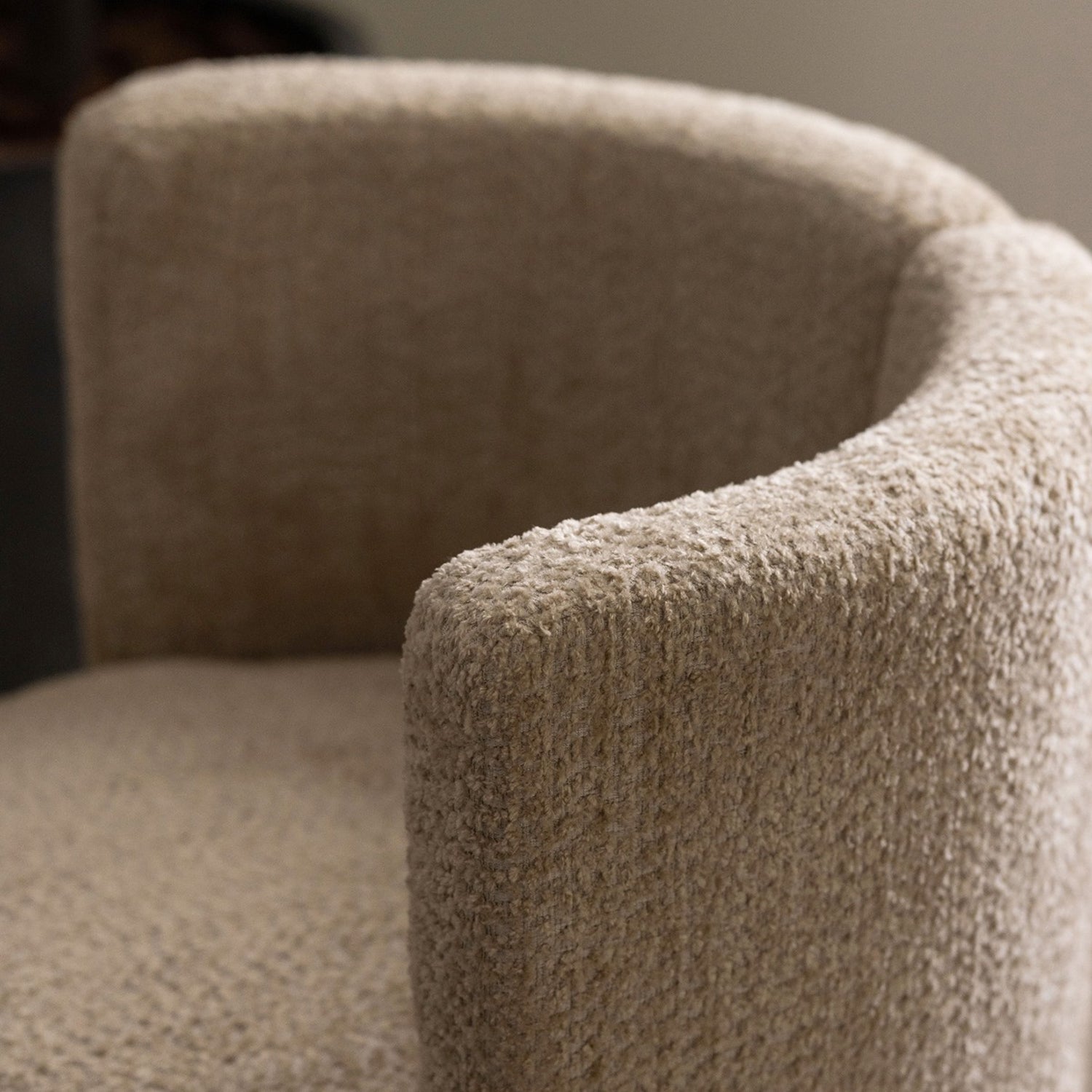 Detail of the swivel base on the Interlude Home Willa Cove Swivel Lounge Chair