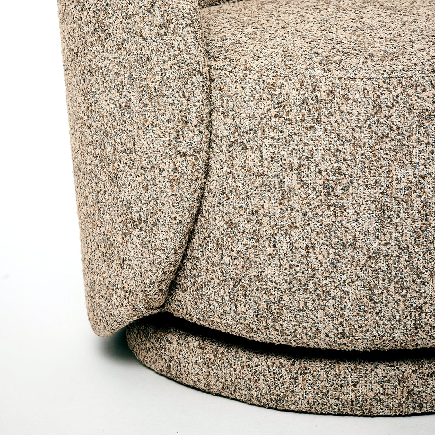 Interlude Home Oslo Hearth Swivel Lounge Chair styled in a living space