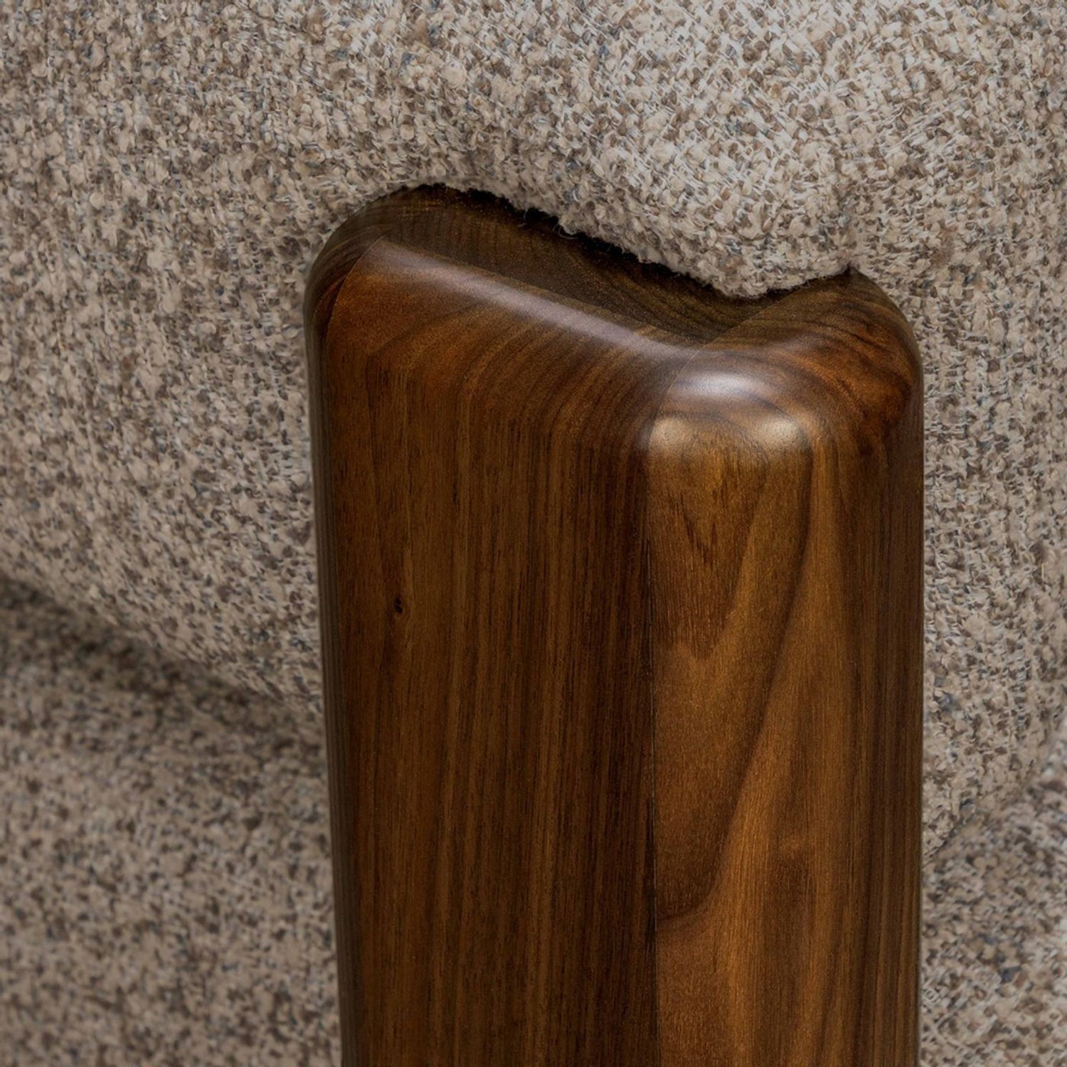 Side profile of the Olivia Classic Walnut Lounge Chair lounge chair in Classic Walnut