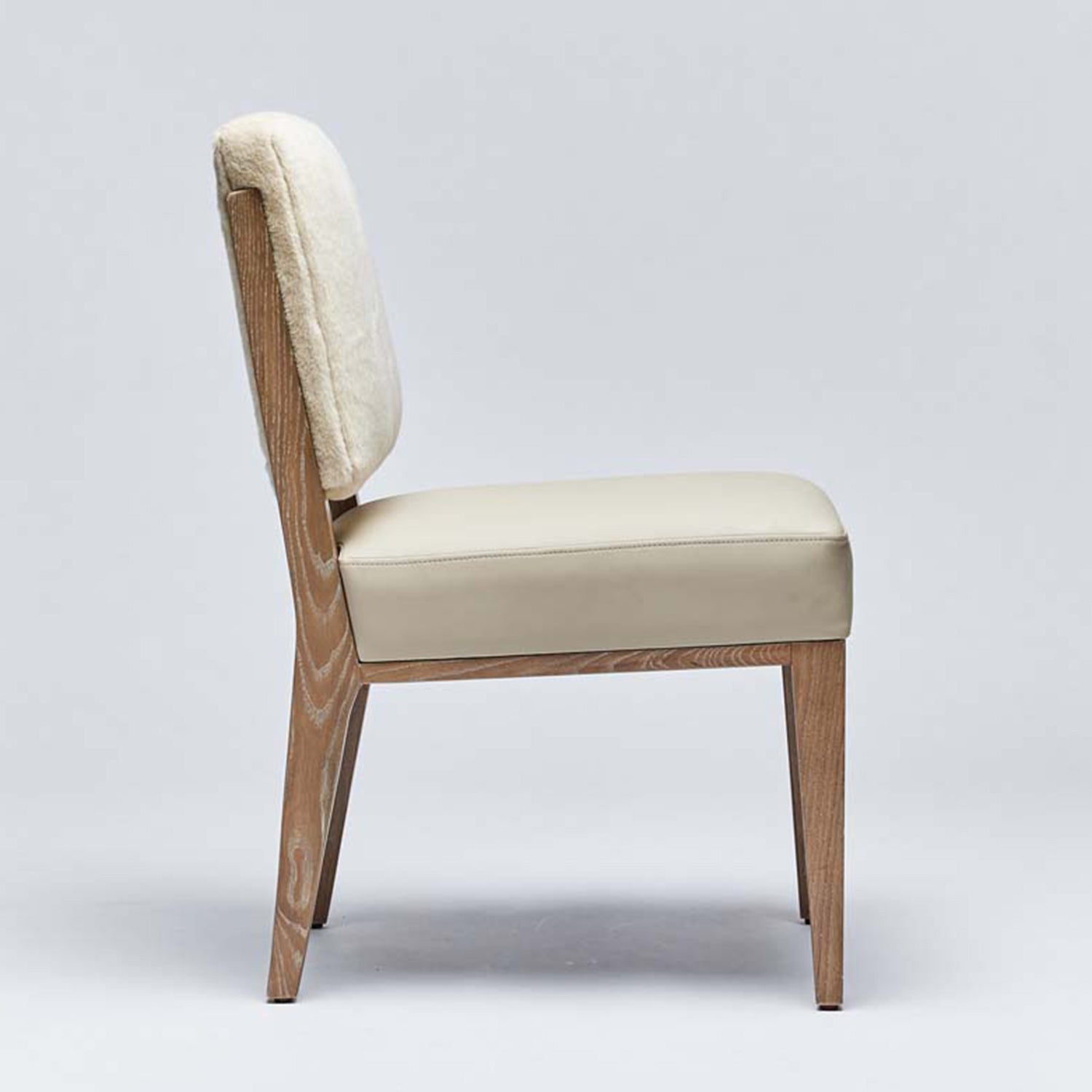 Detail of the seat back on the Interlude Home Marion Cream Latte Dining Chair