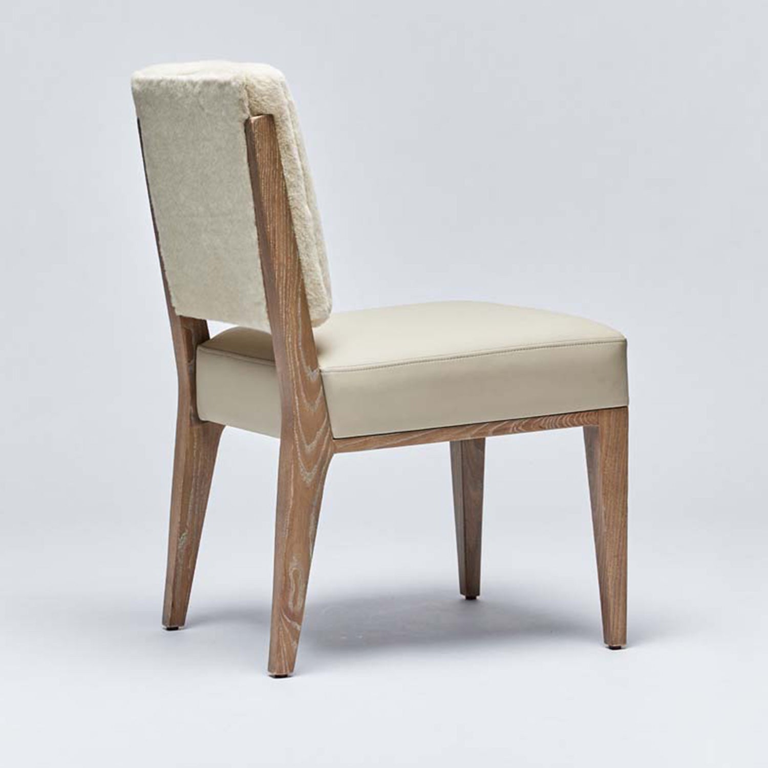 Interlude Home Marion Cream Latte Dining Chair styled in a room