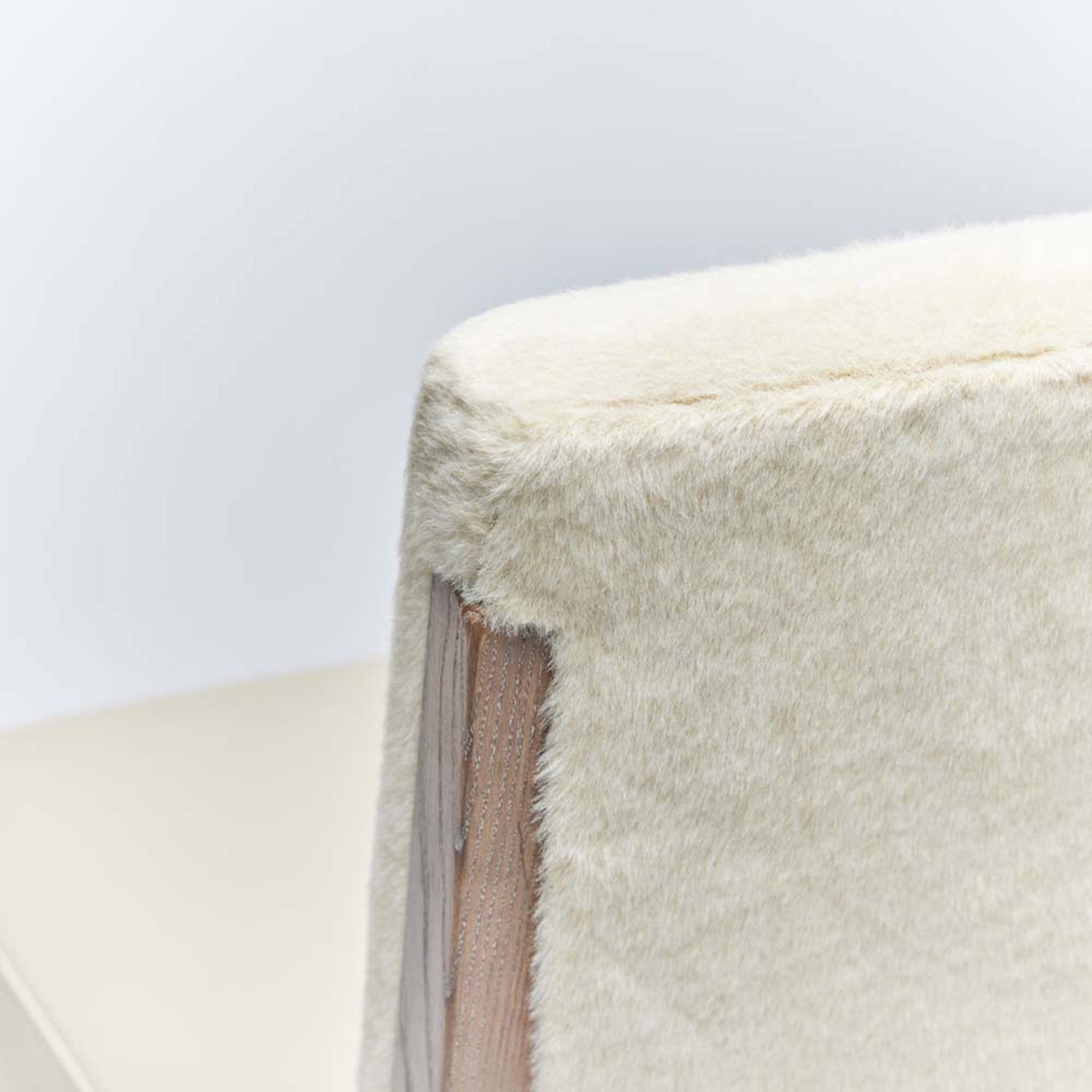 Close-up of the ash finish on the Interlude Home Marion Cream Latte Dining Chair
