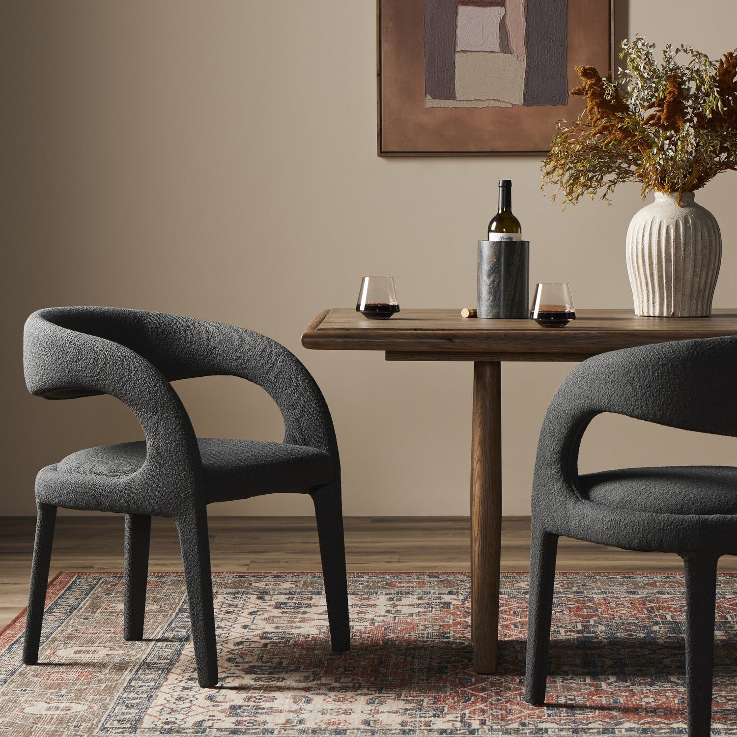 Four Hands Hawkins FIQA Boucle Charcoal Dining Chair styled in a room setting