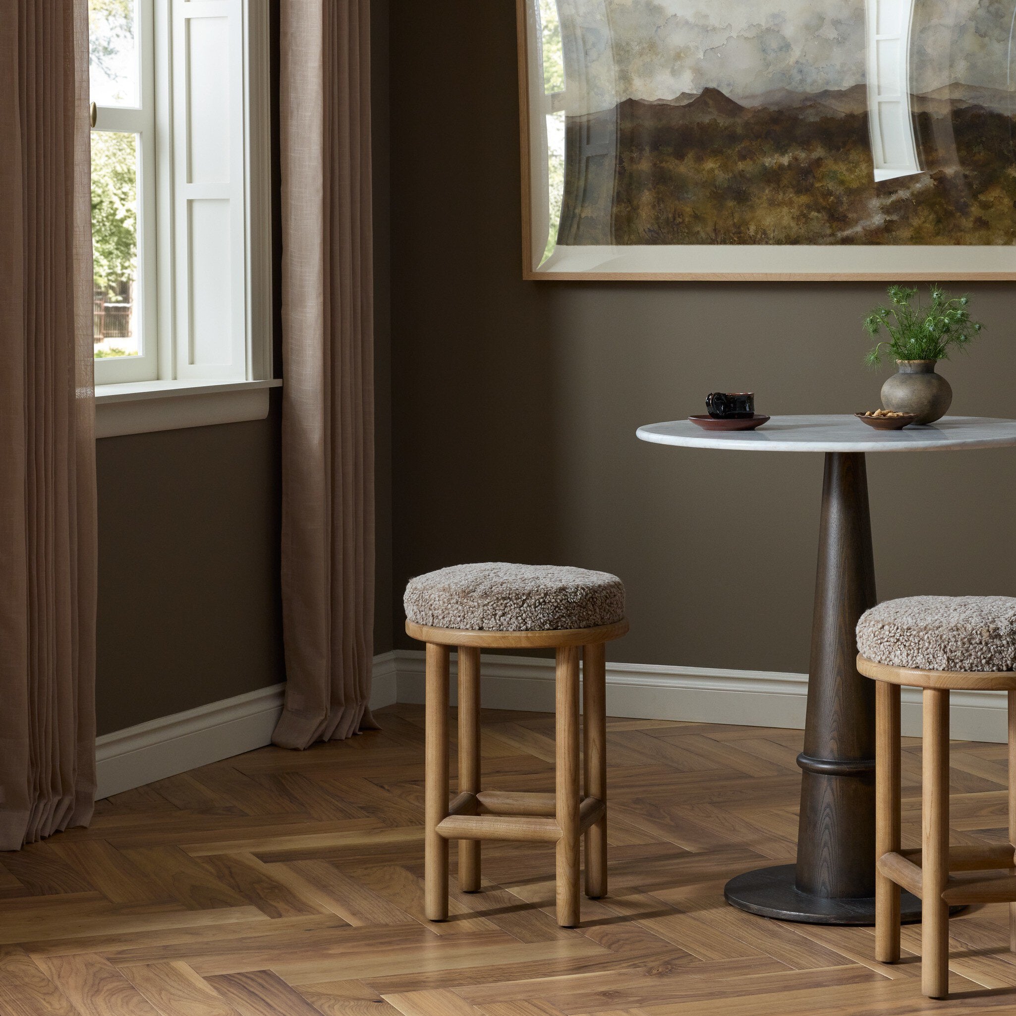Four Hands Saldino Taupe Shearling Counter Stool styled in a room setting