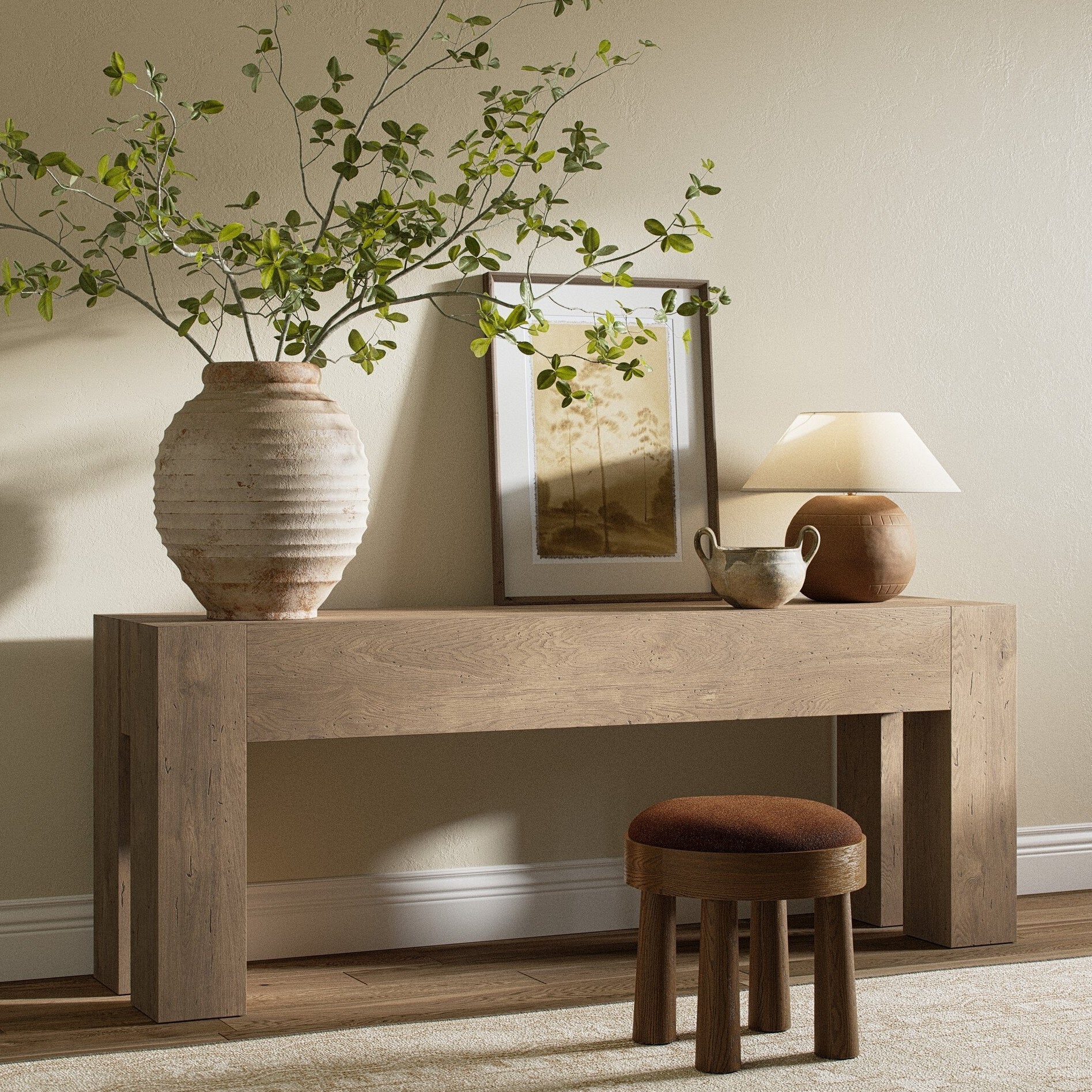 Four Hands Abaso Whitewash Rustic Wormwood Oak Console Table styled in a room setting