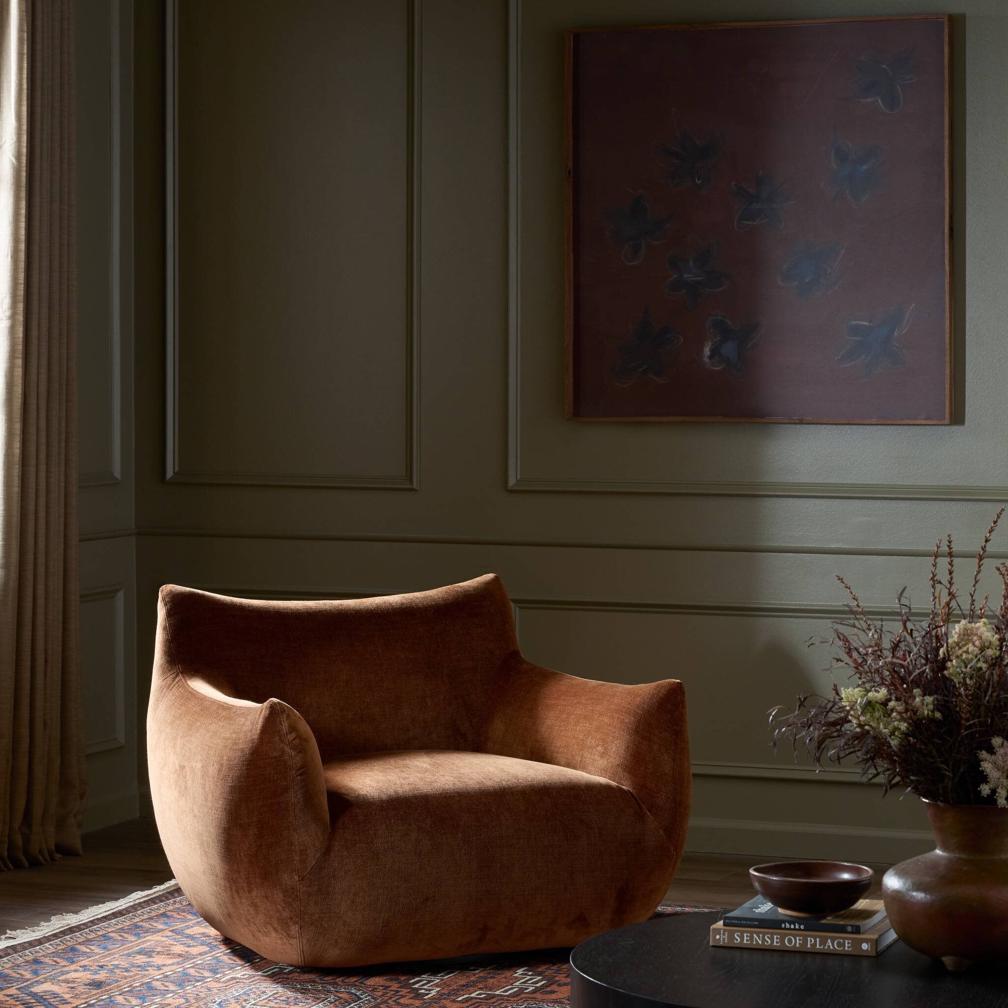 Four Hands Margot Altair Sienna Swivel Chair styled in a room setting