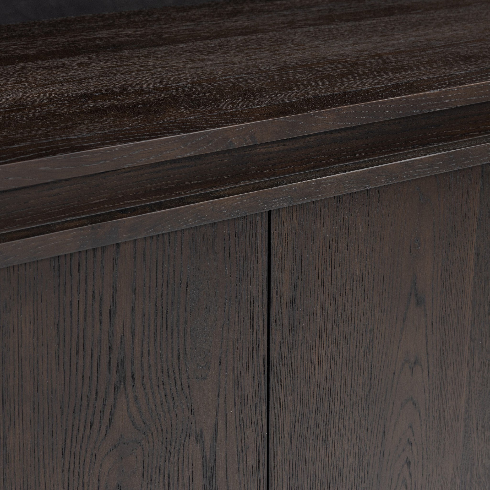 Four Hands Chalmers Smoked Black Resawn Oak Media Console material close-up