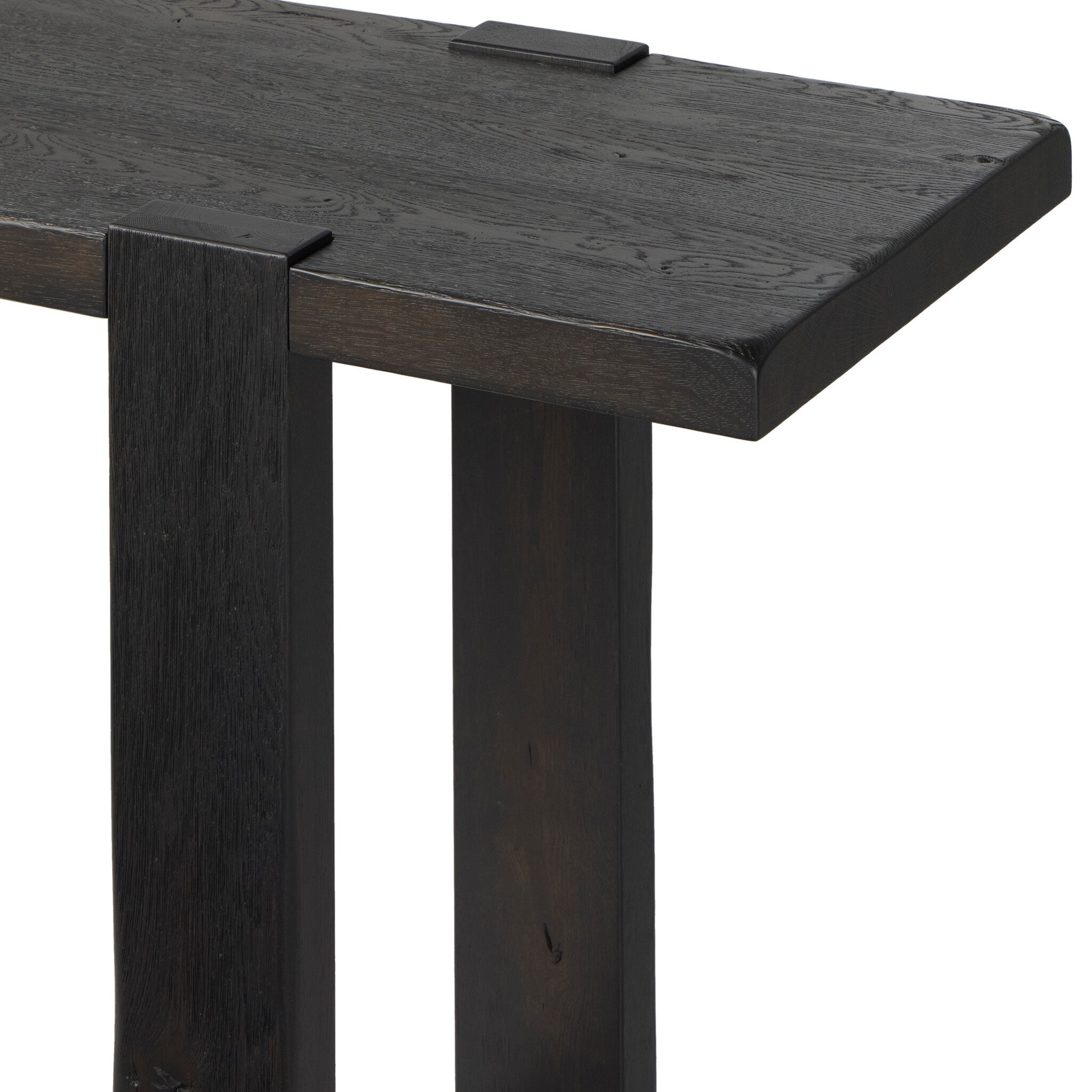 Four Hands Matei Console Table in smoked black solid oak with through-tenon joints, close-up detail of tenon joint, view 2