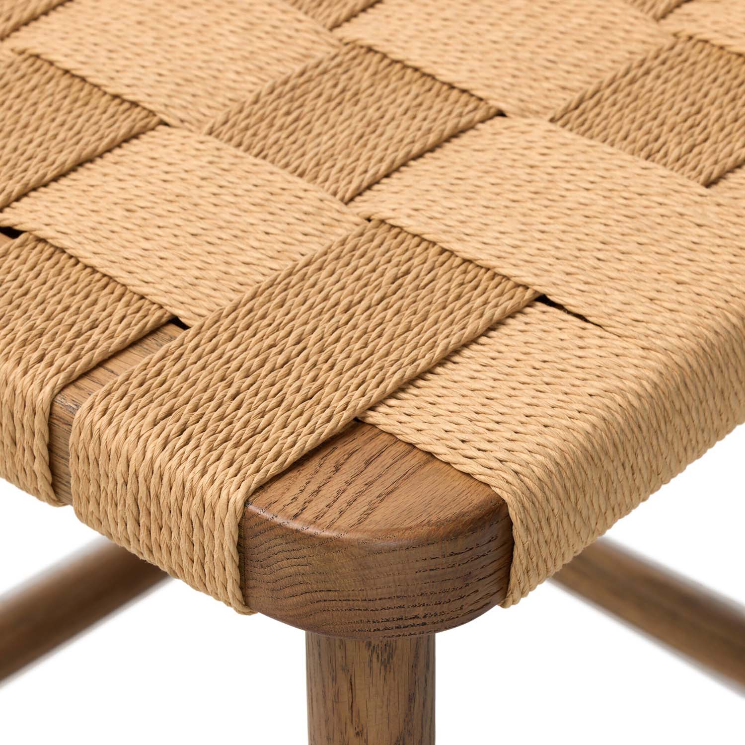 Four Hands Kershaw Counter Stool in smoked oak with rush woven seat, close-up detail of spindle back and rush seat, view 3