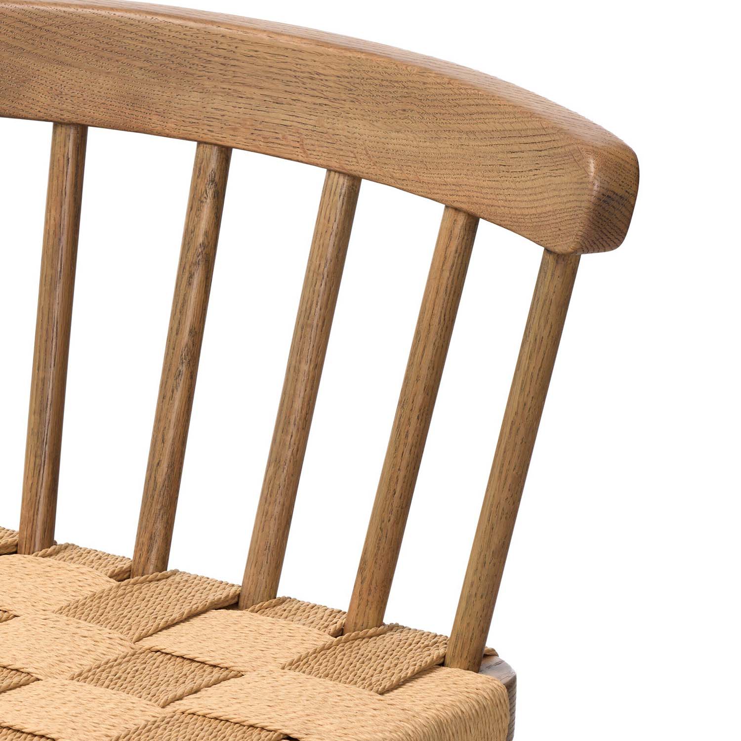 Four Hands Kershaw Counter Stool in smoked oak with rush woven seat, close-up detail of spindle back and rush seat, view 4