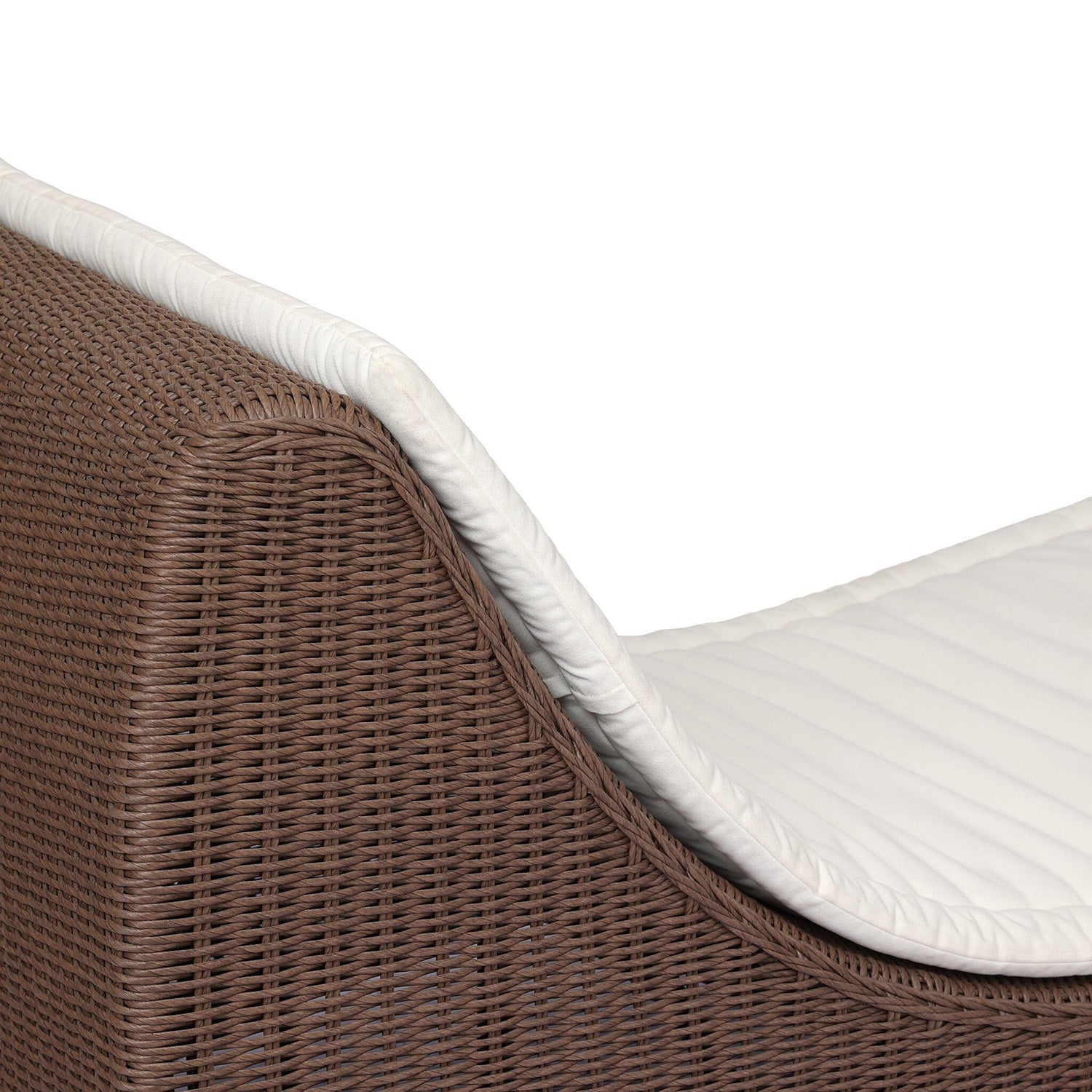 Four Hands Mazu Outdoor Chaise in tanned weave with salt cushion, close-up detail of woven base, view 5