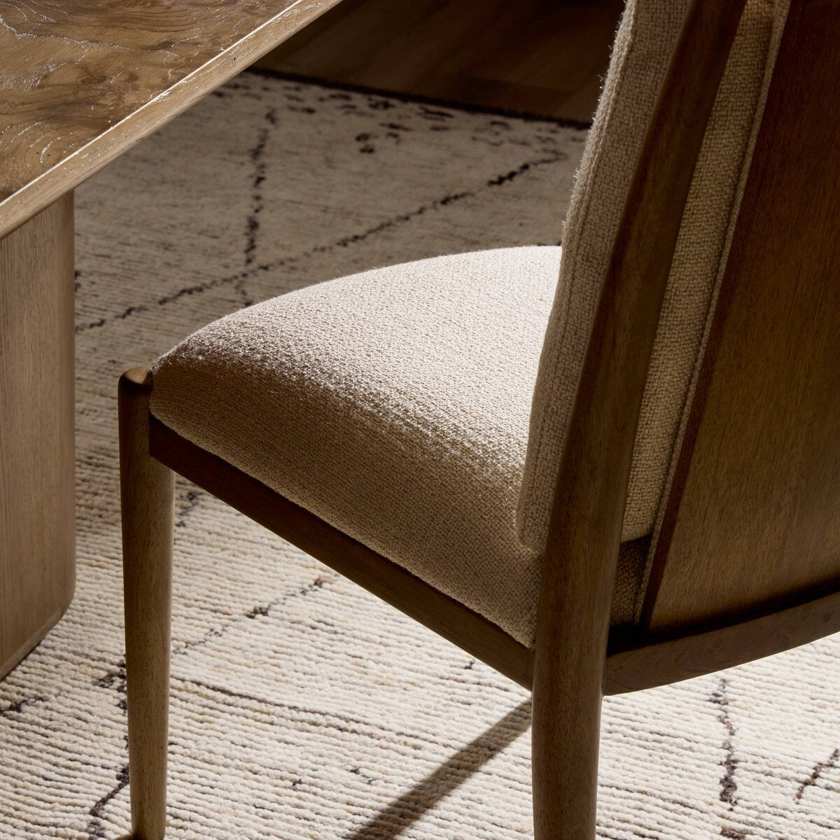 Four Hands Gallagher Irving Flax Dining Chair Set of 2 on amber parawood, close-up detail of fabric, view 2