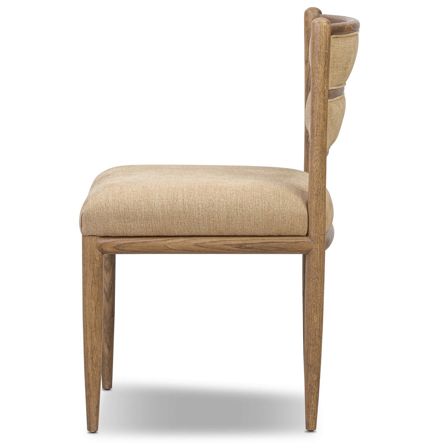 Four Hands Artie Dining Chair in Laughlin Natural on amber oak, side profile view