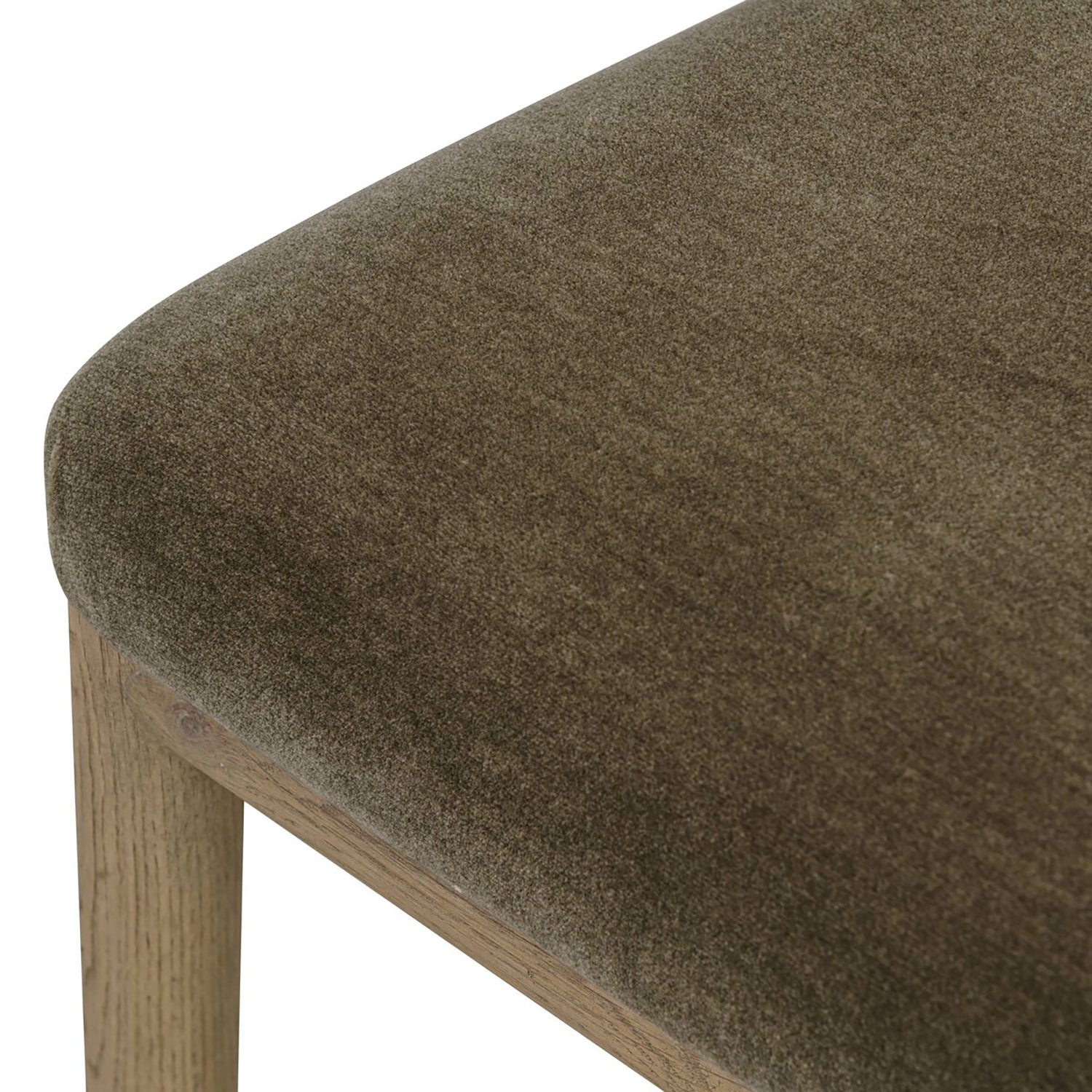 Four Hands Artie Wool Dining Chair in Monte Olive on drifted oak, close-up detail of tufted channeling, view 5