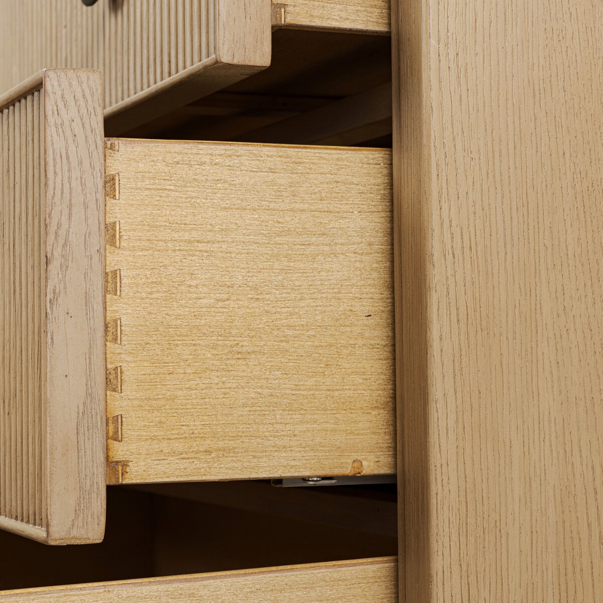 Four Hands Hazel 6 Drawer Dresser in light wash oak with reeded fronts, close-up detail of reeding, view 5
