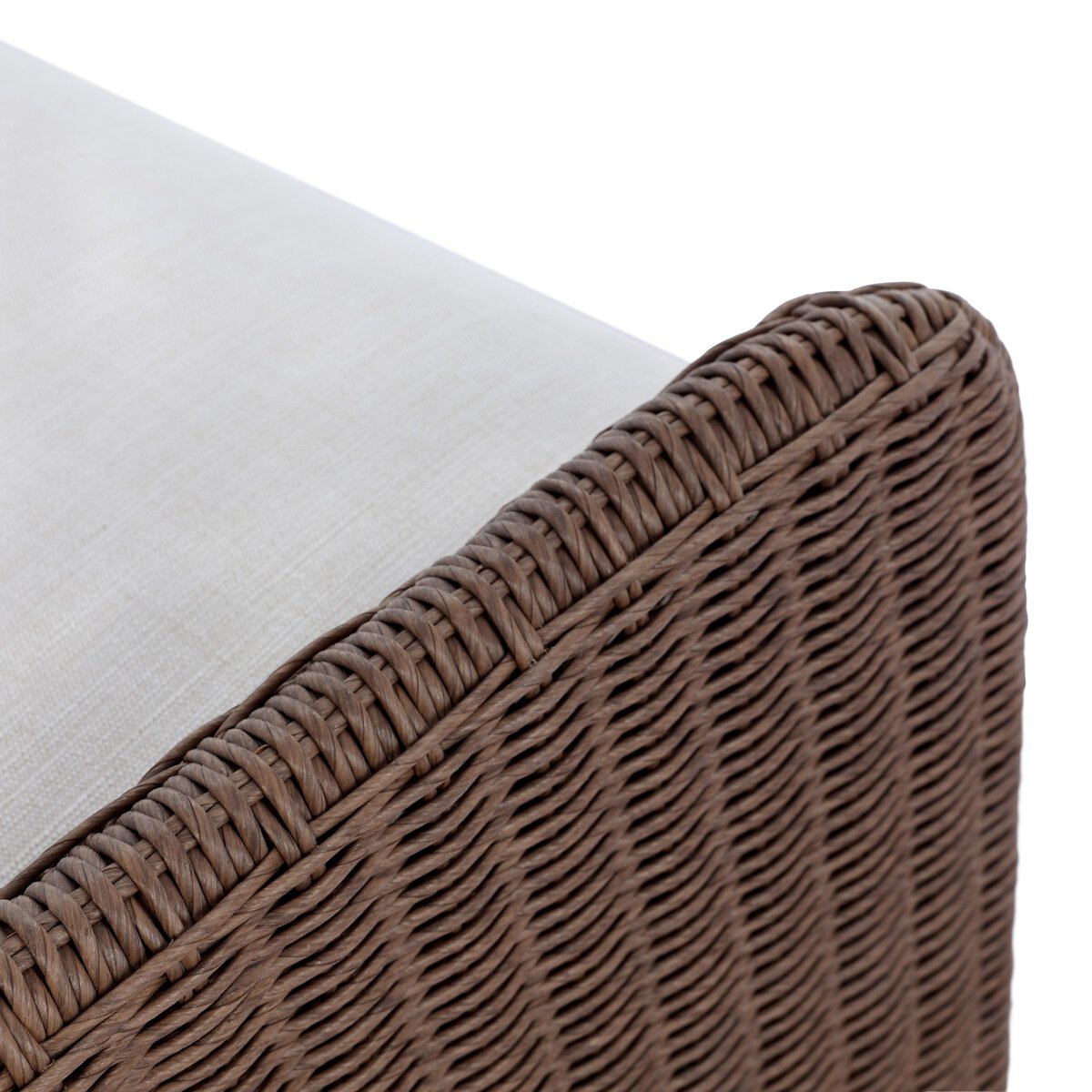 Four Hands Blaire Outdoor Chair in tanned woven with cream cushion, close-up detail, view 5