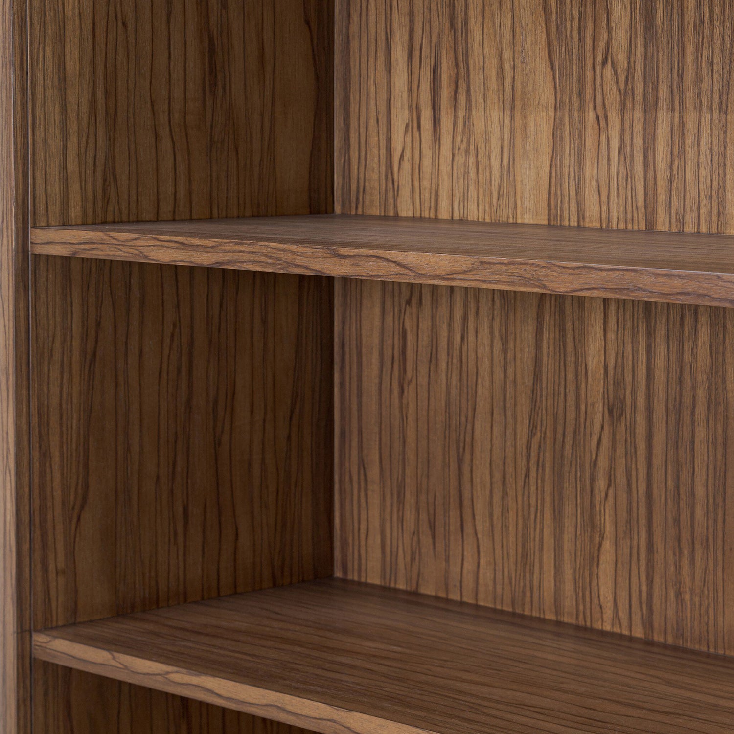 Four Hands Limba Bookcase in medium brown limba veneer, close-up detail of wood grain, view 3