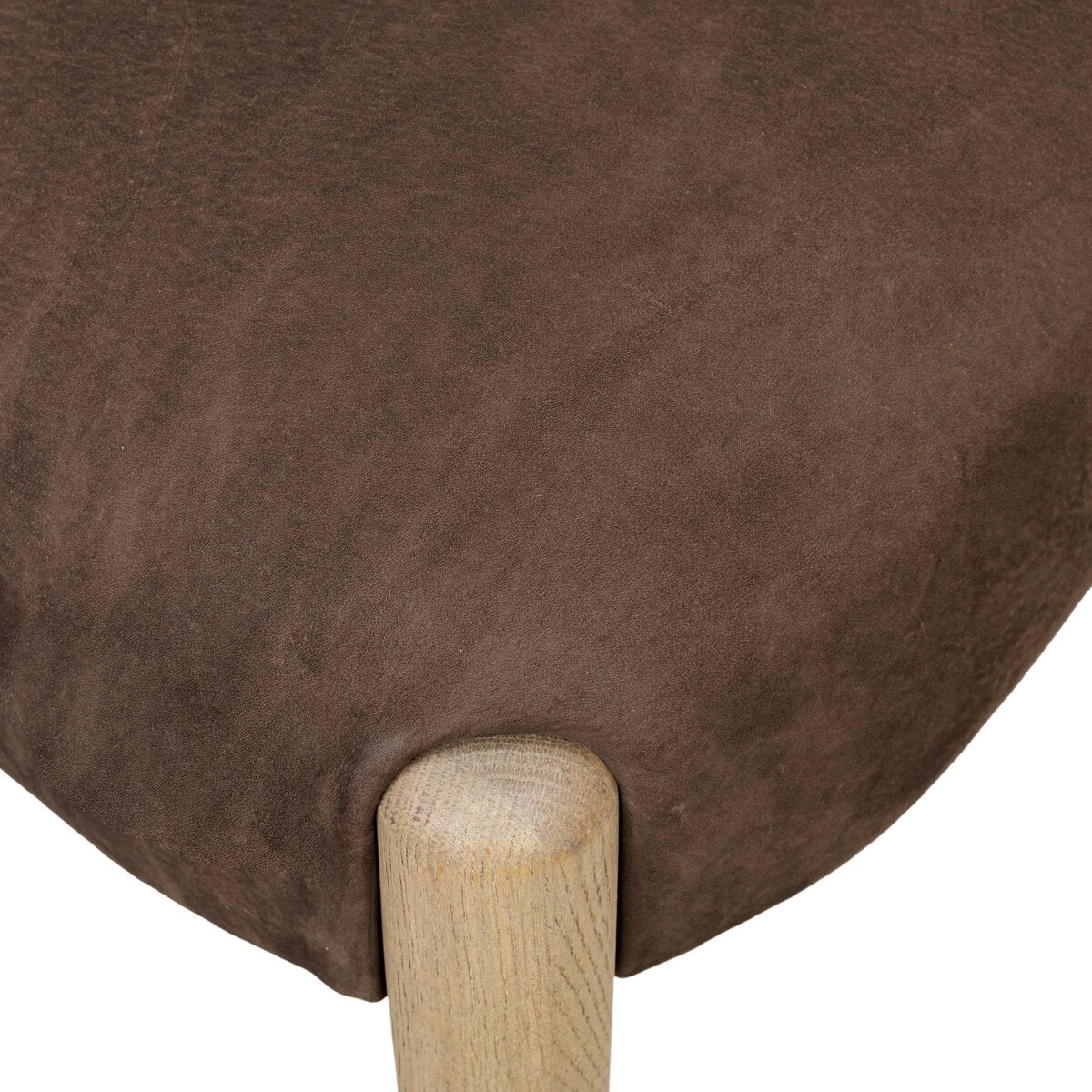 Four Hands Prentiss Dining Chair in nubuck cigar leather, close-up detail of leather and oak frame, view 4
