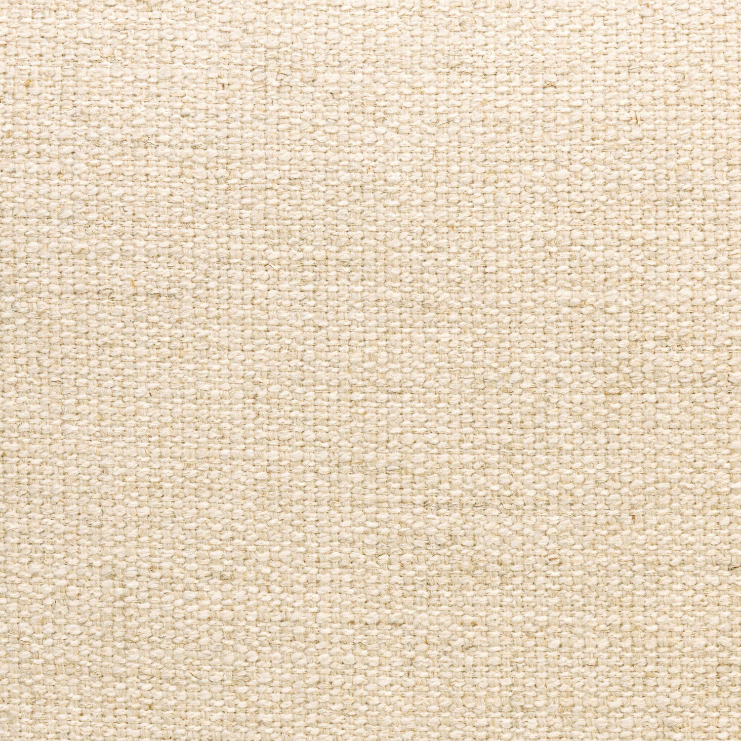 Four Hands Prentiss Thames Cream Dining Chair Set of 2 on drifted oak, close-up detail of tapered leg
