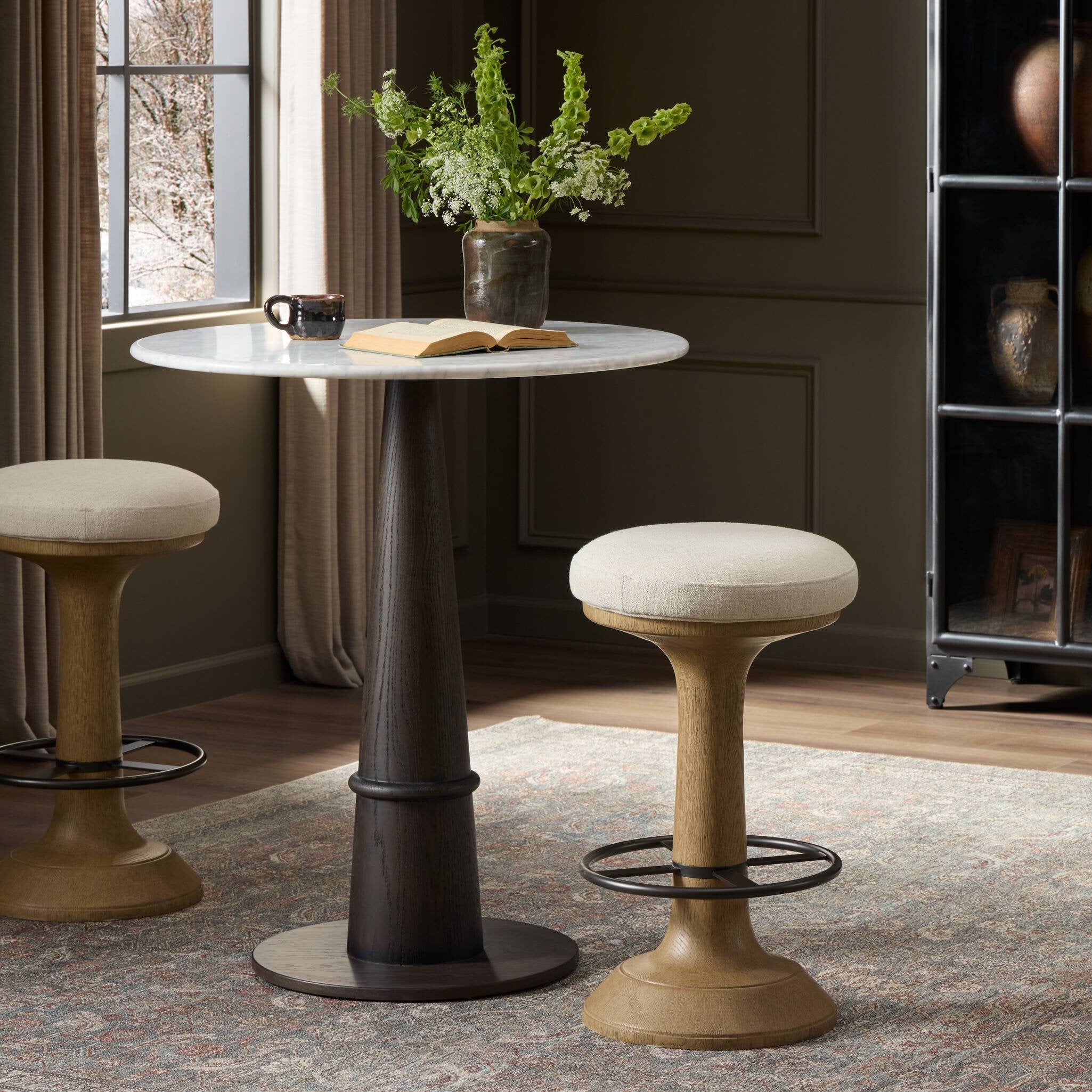 Four Hands Montclair Antwerp Natural Counter Stool styled in a room setting