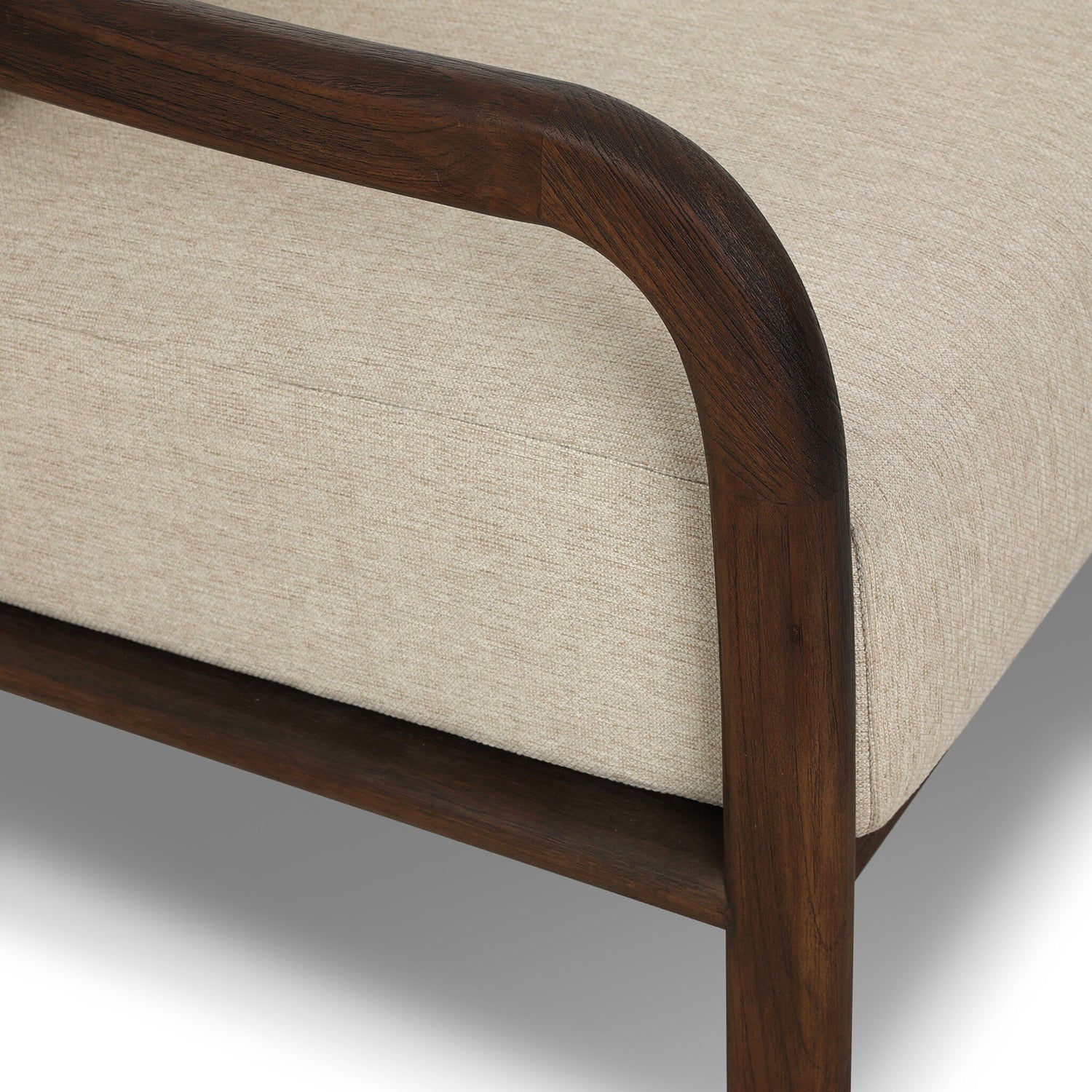 Four Hands Boda Outdoor Chair in teak with faux hyacinth weave and beige cushion, close-up detail, view 2