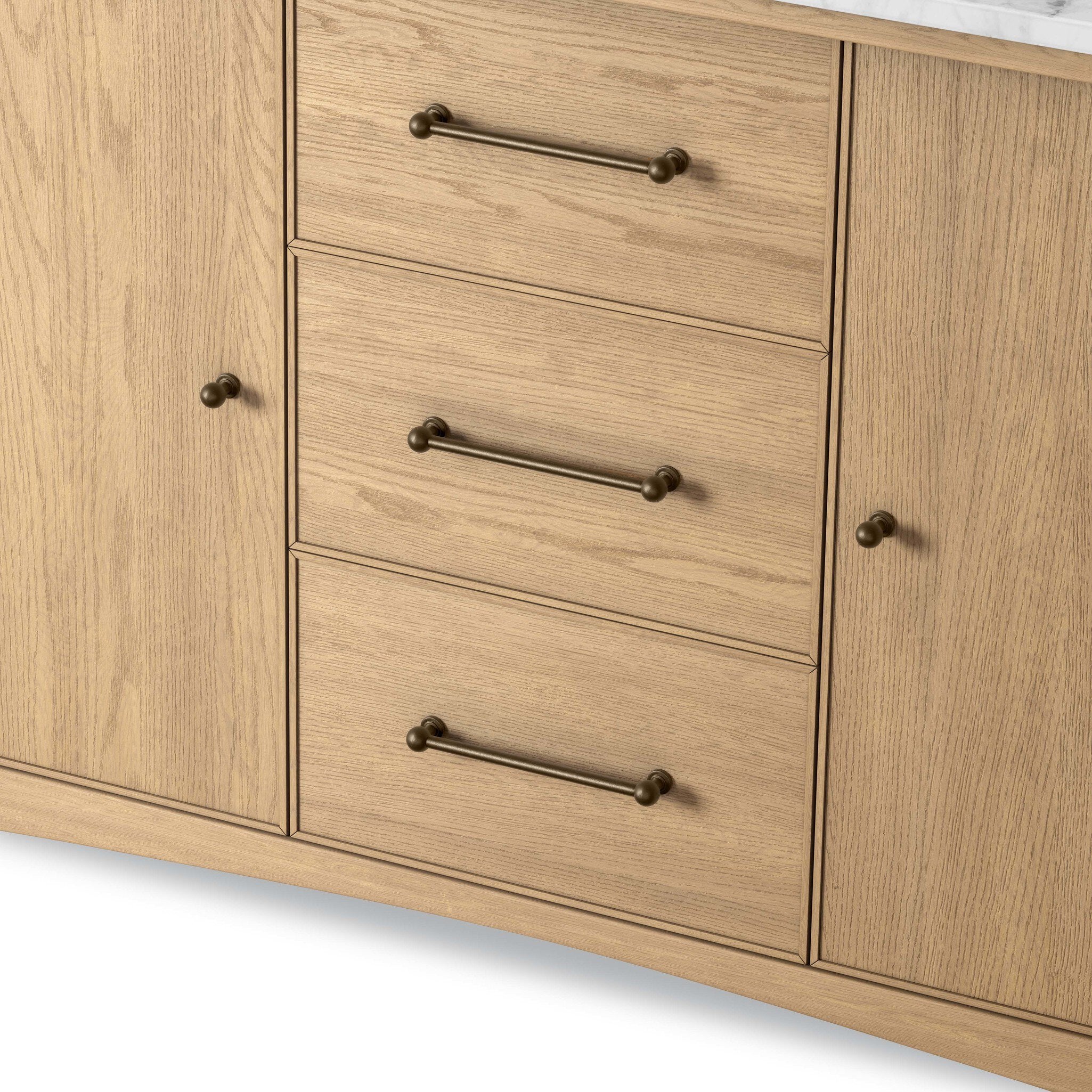 Four Hands Porter Single Wide Vanity in satin light wash oak with Carrara marble, close-up detail of dowel leg