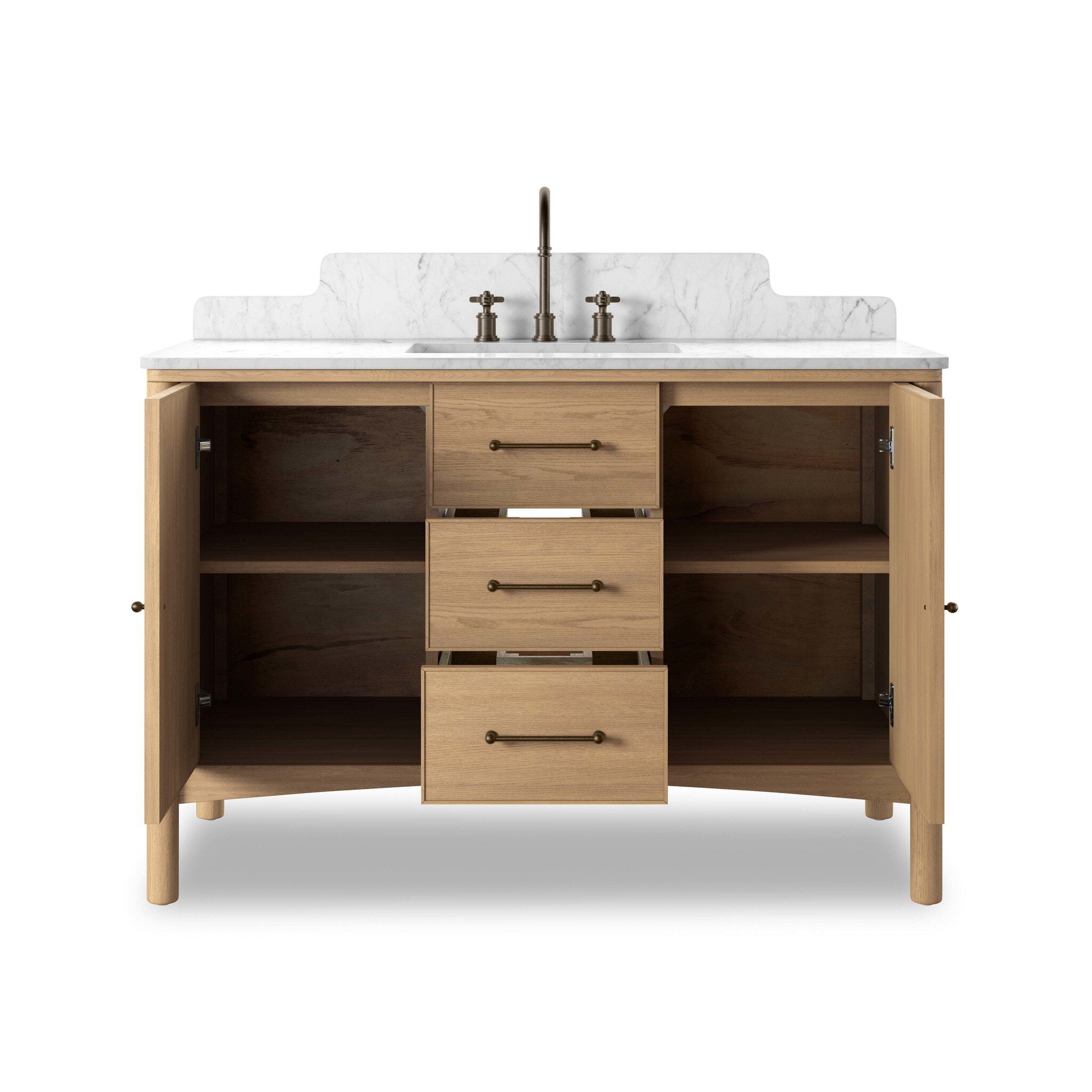 Four Hands Porter Single Wide Vanity in satin light wash oak with Carrara marble, close-up detail of arch frame and hardware