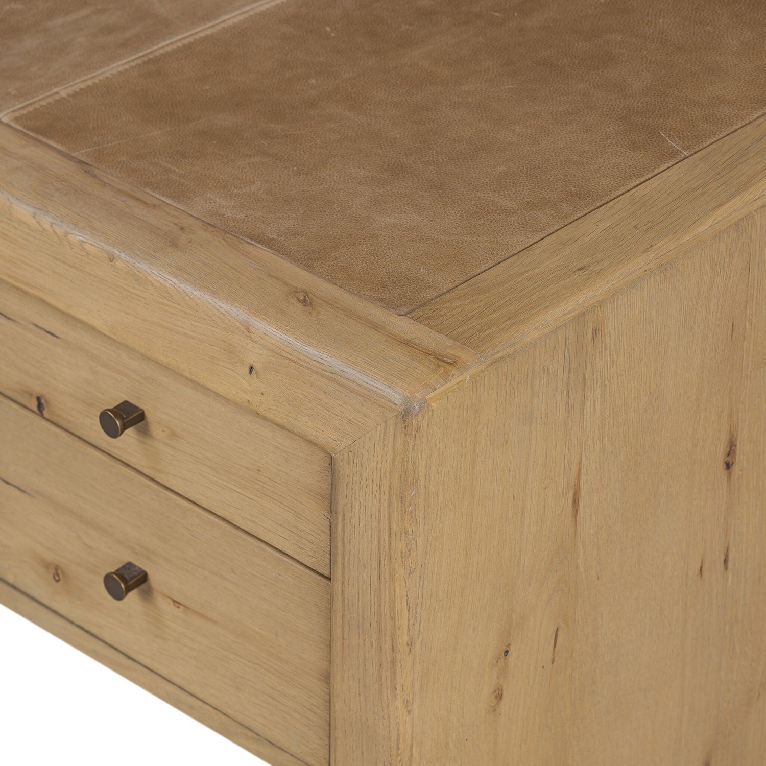 Four Hands Nico Desk in natural oak with leather inlay top, close-up detail of leather inlay and oak grain, view 2
