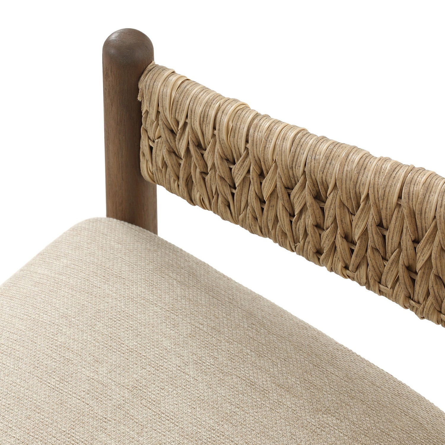 Four Hands Atwood Outdoor Chair in teak with coastal weave and beige cushion, close-up detail, view 5