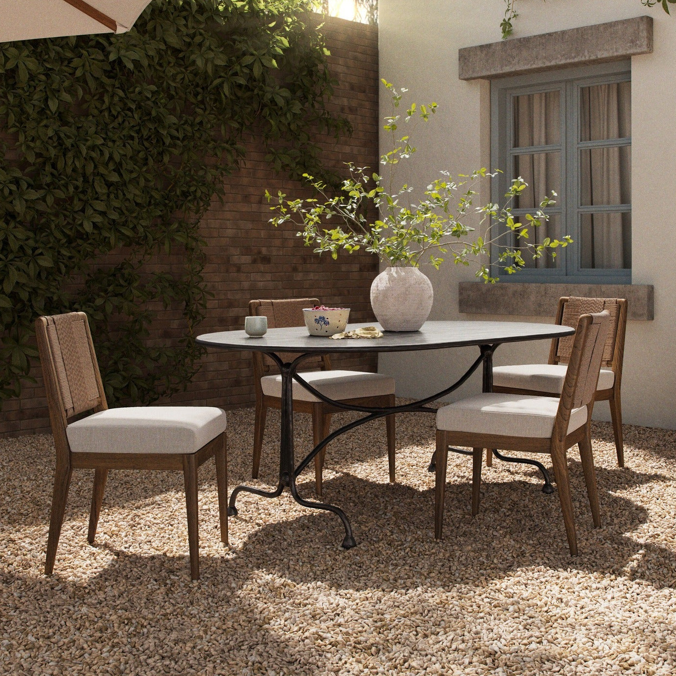 Four Hands Lenoir Distressed Bronze 76in Outdoor Dining Table