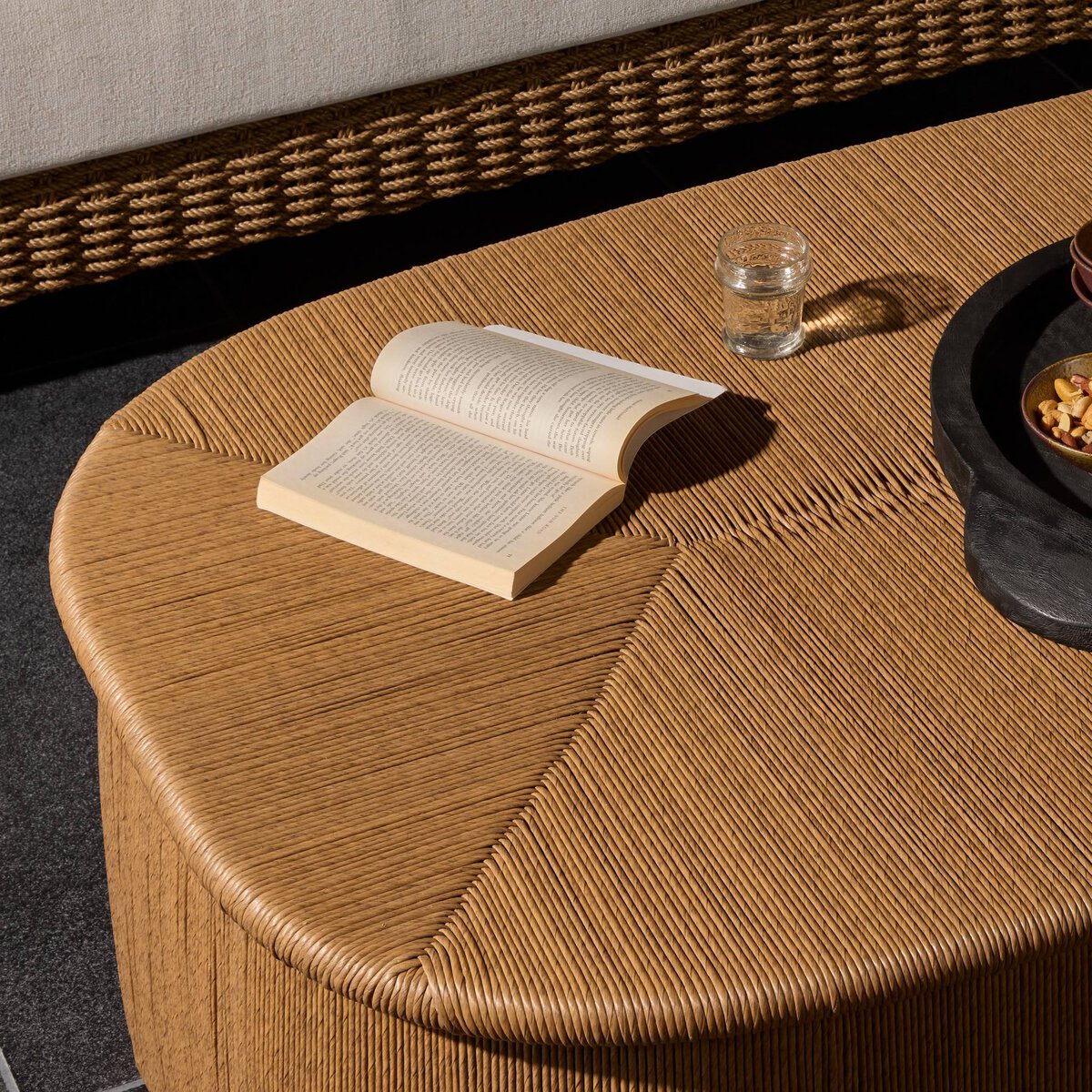 Four Hands Taum Outdoor Coffee Table in textured sand vertical-weave, close-up detail of cord weave, view 1