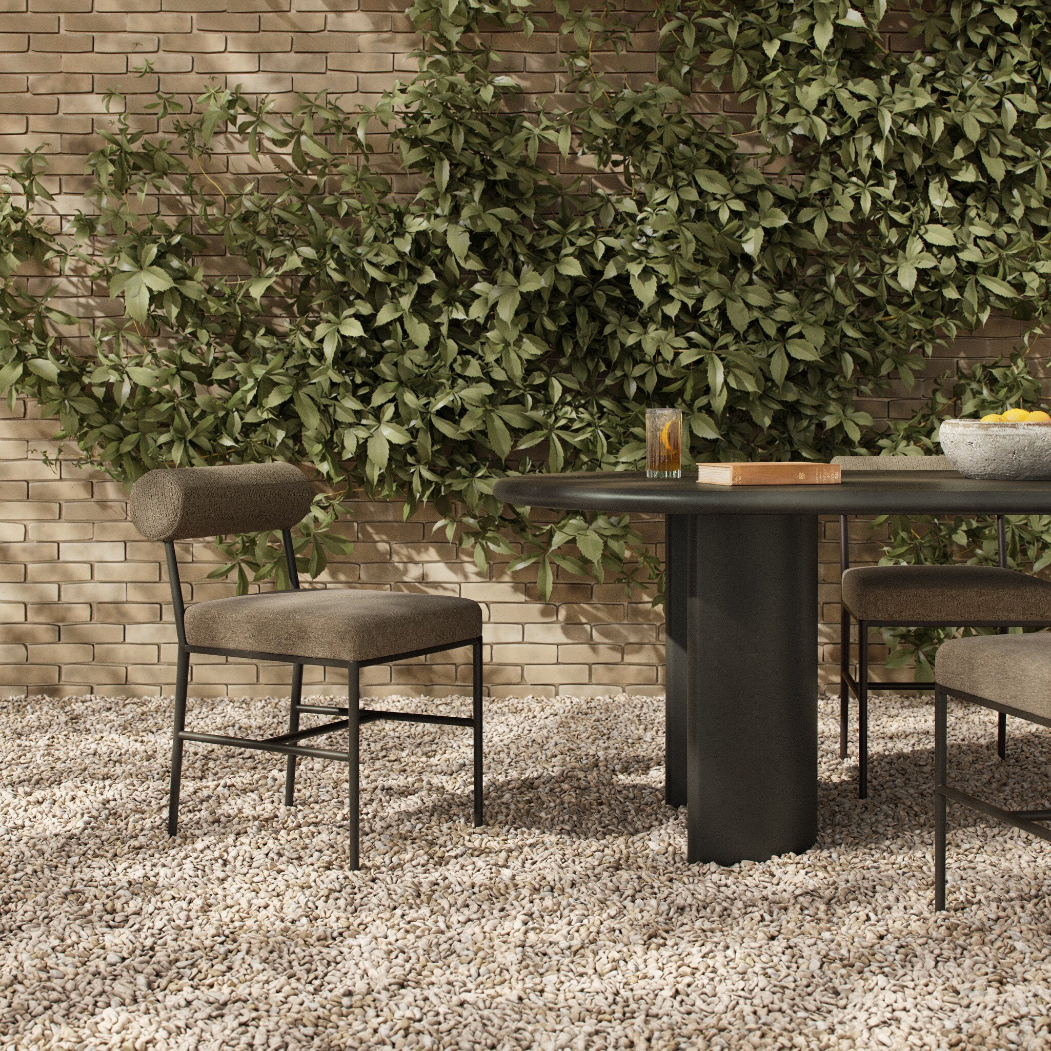 Four Hands Brookline Alessi Fawn Outdoor Dining Chair in a styled room setting