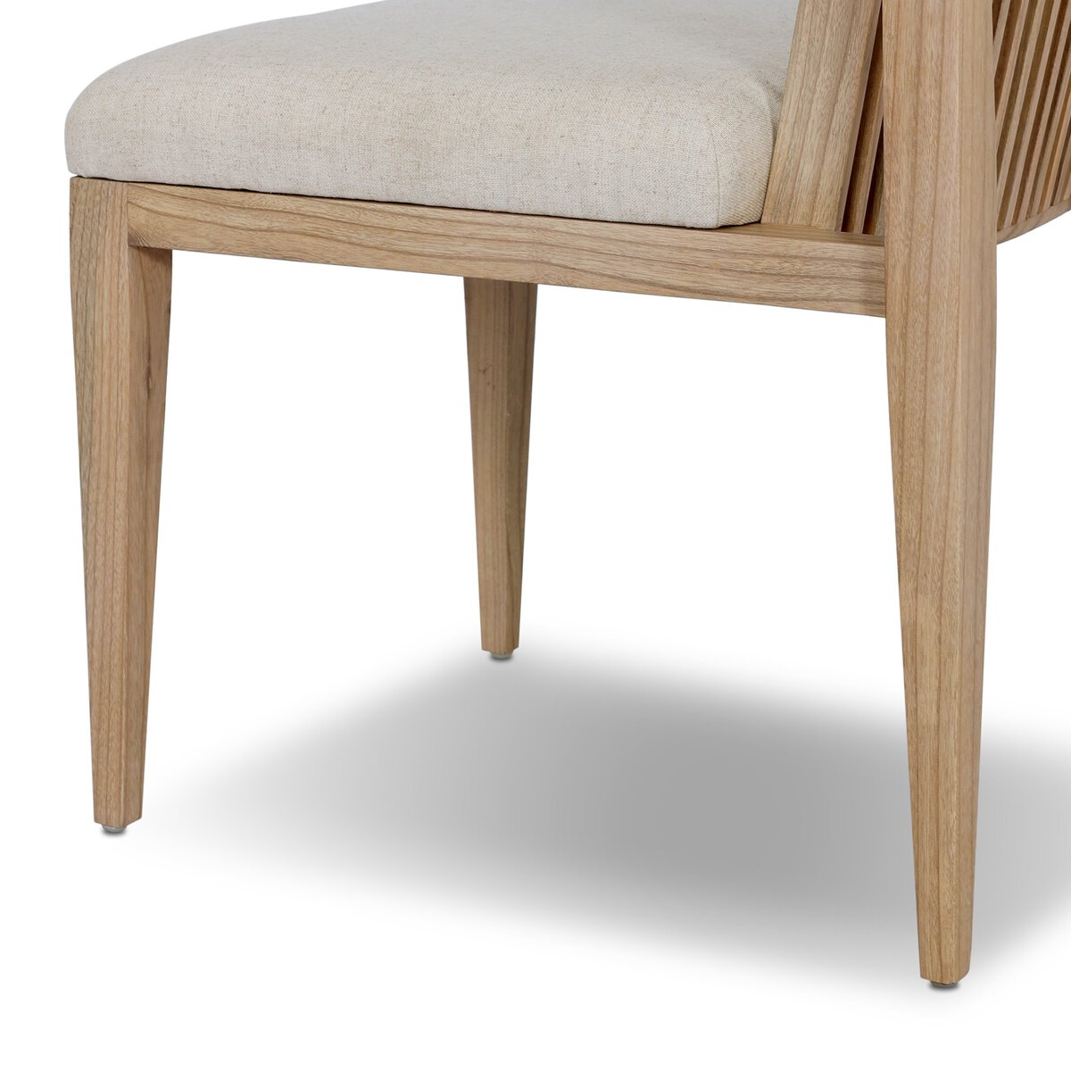 Four Hands Cavallo Dining Chair Set of 2 in sand linen with slatted sungkai back, close-up detail of slatted back, view 3
