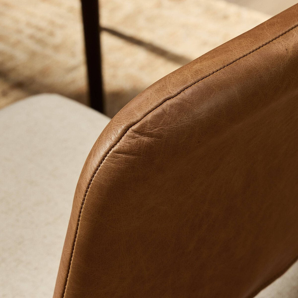 Four Hands Ryver Antwerp Natural Dining Chair Set of 2 with leather back on toasted ash, close-up detail of fabric seat, view 2