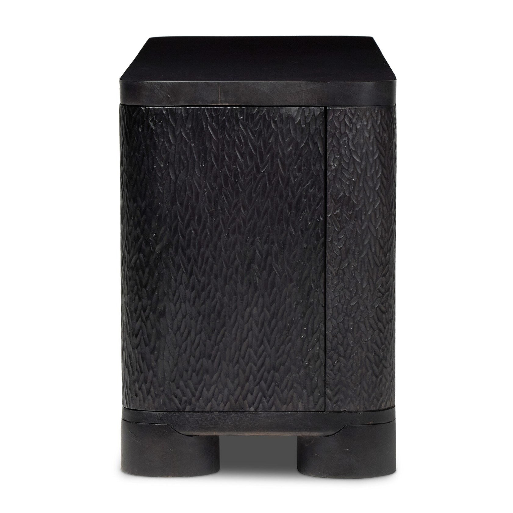 Four Hands Shevall Sideboard in carved black mango with cylinder legs, side profile view