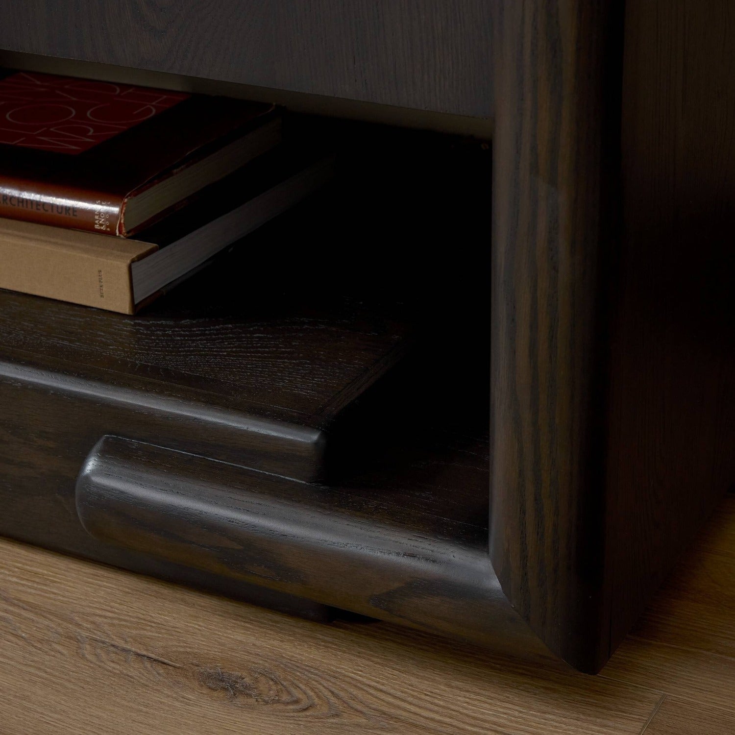 Four Hands Zaki Smoked Black Sideboard with waterfall framing on floating oak base, alternate styled view