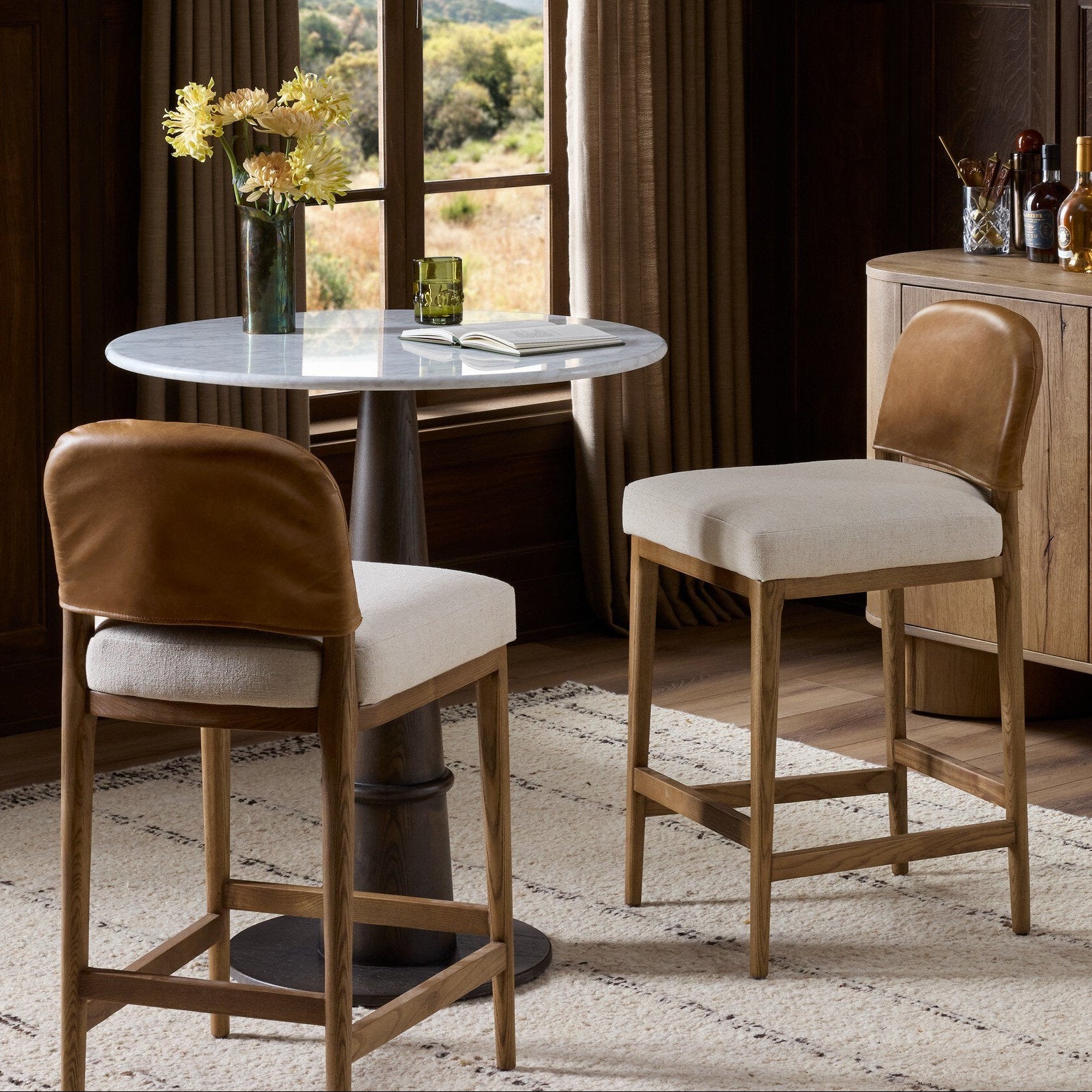 Four Hands Ryver Antwerp Natural Counter Stool in a styled room setting