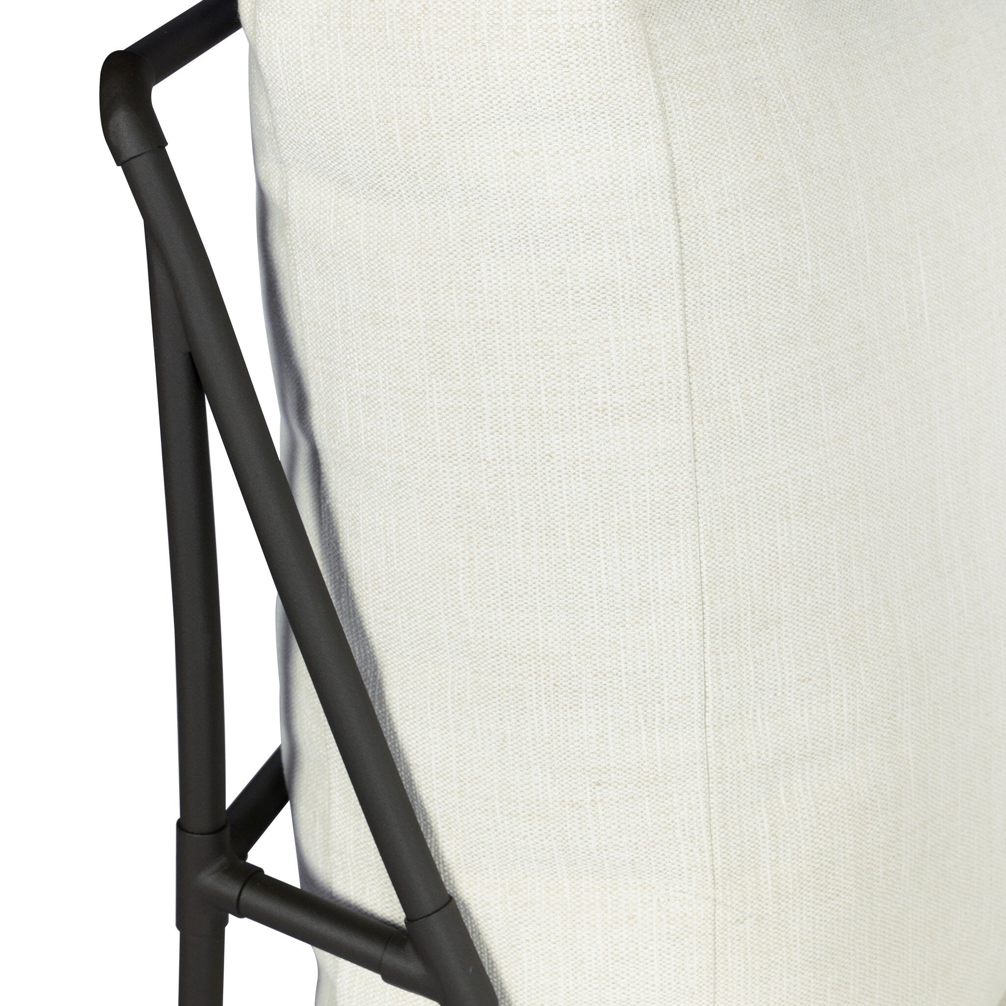 Four Hands Enola Outdoor Swivel Chair in bronze iron cross-hatch with cream cushion, close-up detail of ironwork, view 5