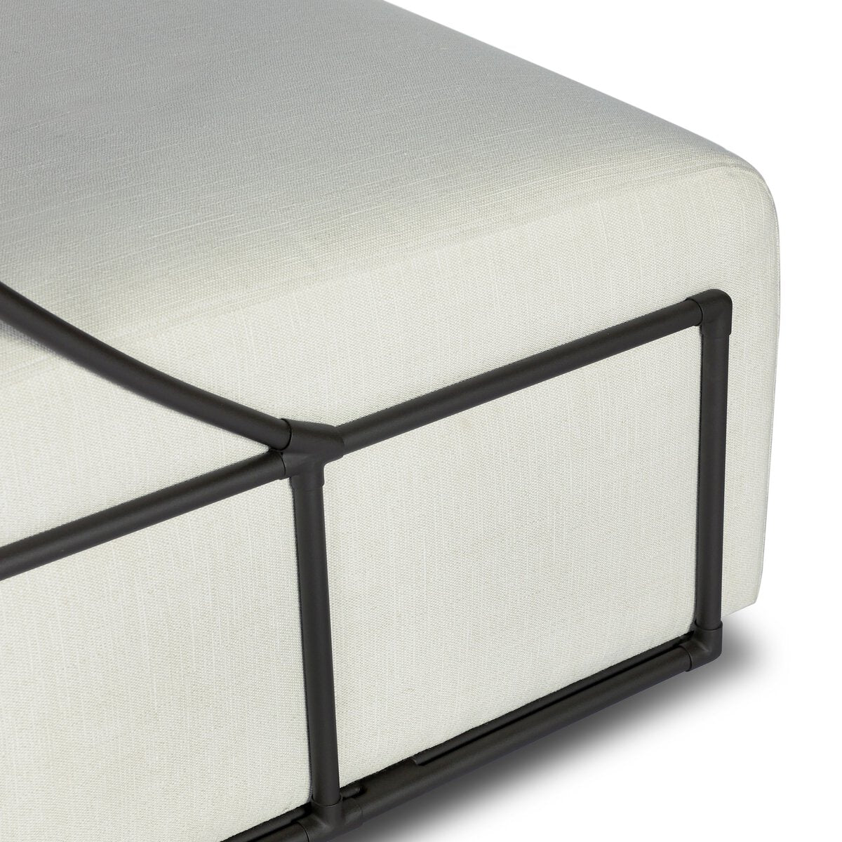 Four Hands Enola Outdoor Swivel Chair in bronze iron cross-hatch with cream cushion, close-up detail of ironwork, view 3