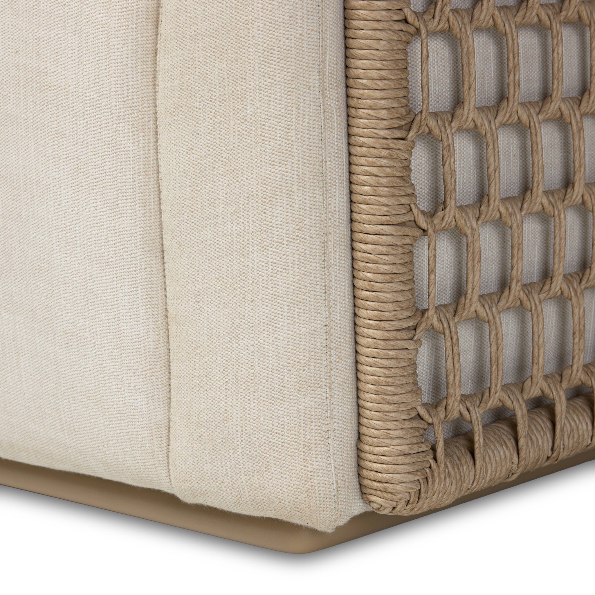 Four Hands Emilian Outdoor Swivel Chair in vintage white woven with cream cushion, close-up detail of weave, view 4