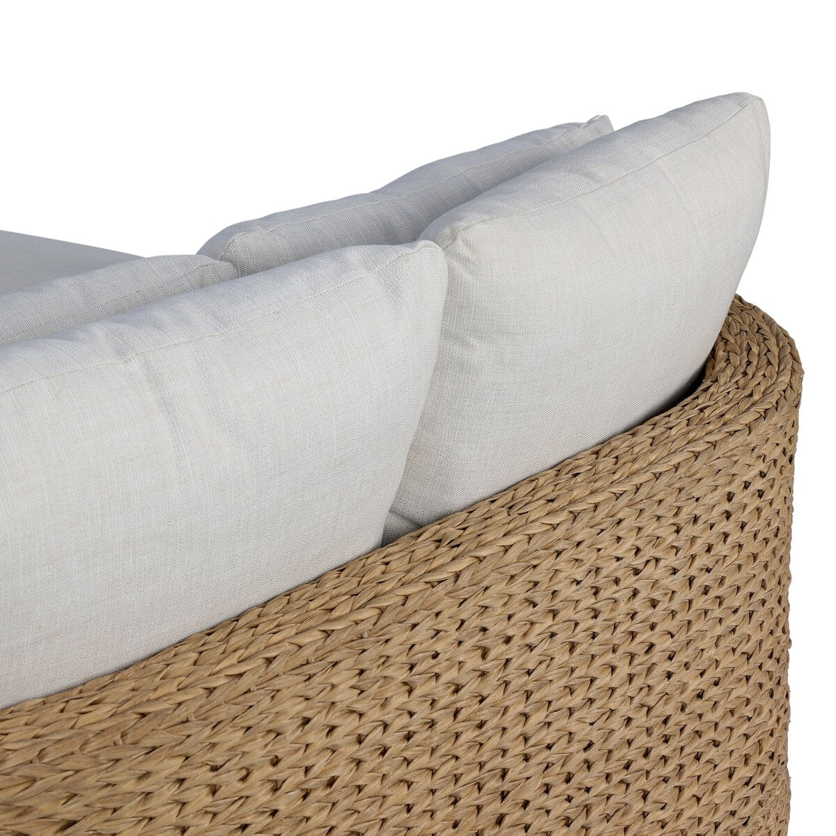 Four Hands Caney Outdoor Double Chaise in coastal weave with cream cushion, close-up detail, view 5