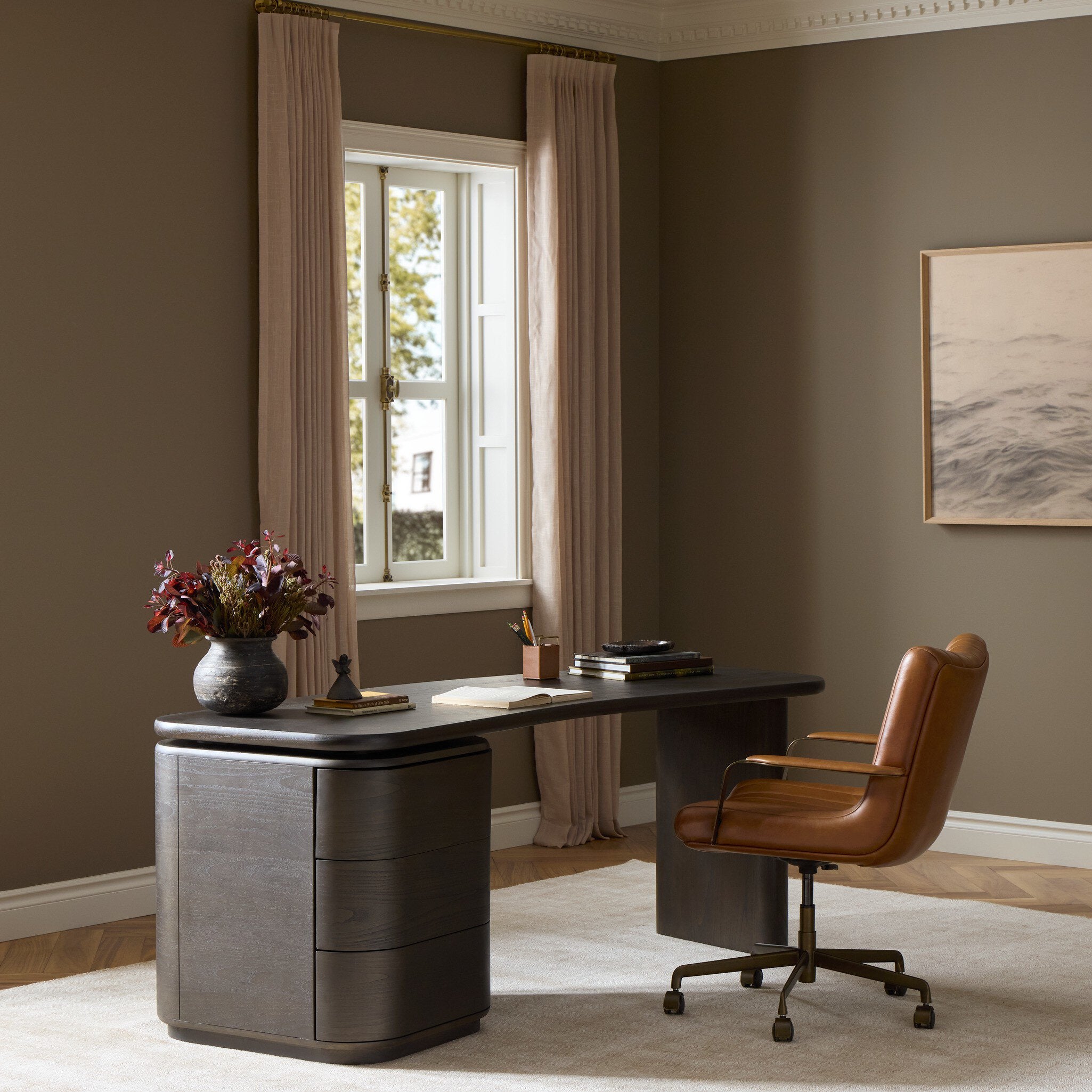 Four Hands Hawthorne Smoked Black Sungkai Desk in a styled room setting