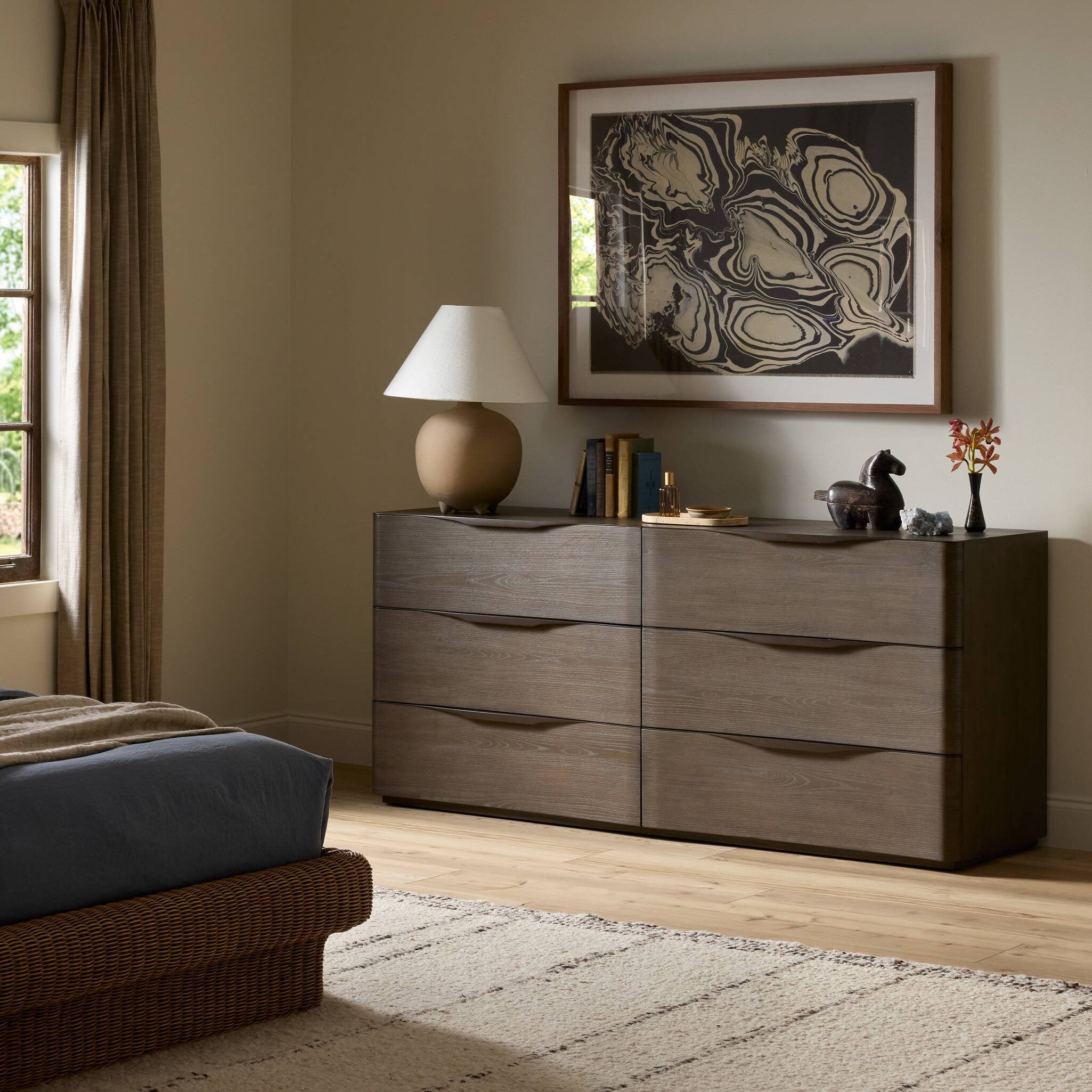 Four Hands Amiro Tumble Brown Ash 6 Drawer Dresser in a styled room setting