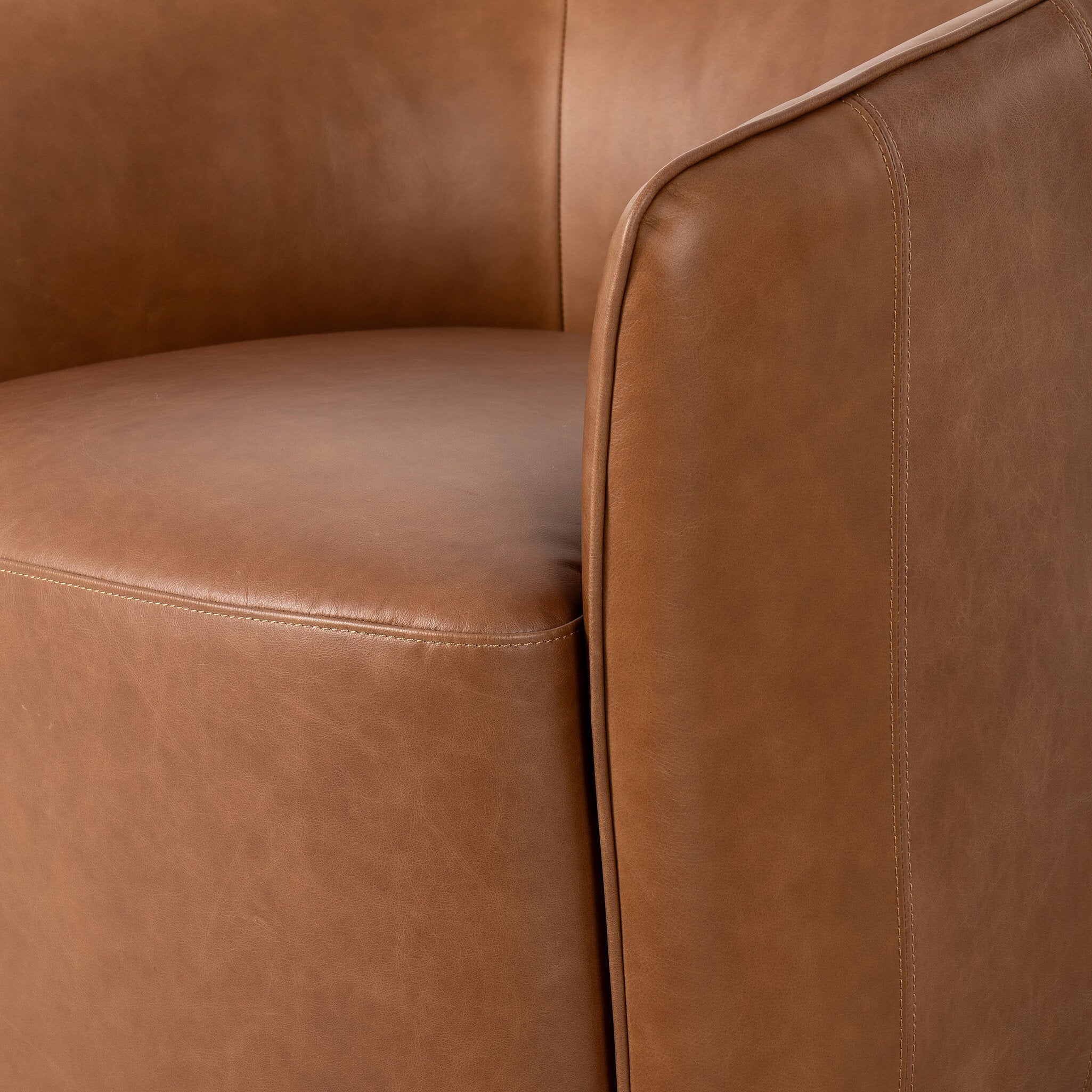 Four Hands Rodgers Sonoma Chestnut Swivel Chair close-up detail 3